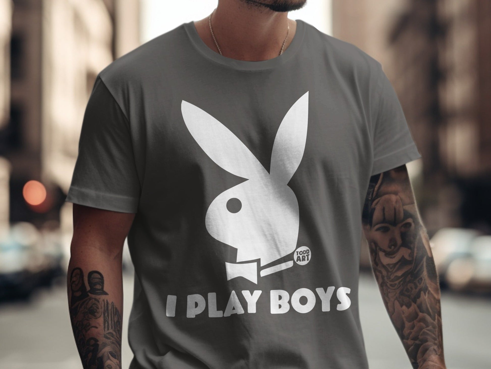 Grey t-shirt with white Playboy bunny logo and "I PLAY BOYS" text.