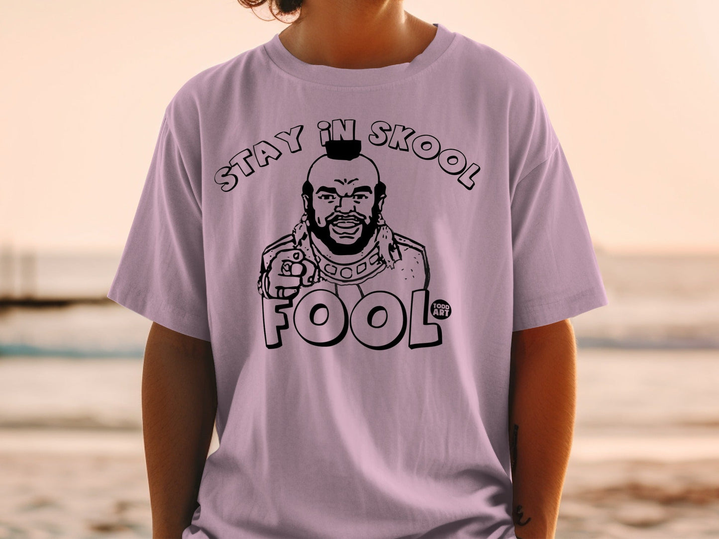 Pink t-shirt featuring Mr. T with "STAY IN SKOOL FOOL" text.