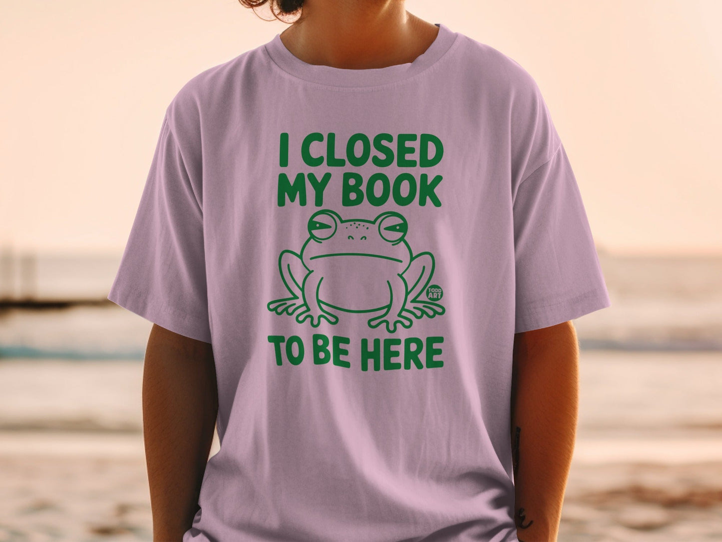 I Closed My Book To Be Here Frog Graphic T-shirt