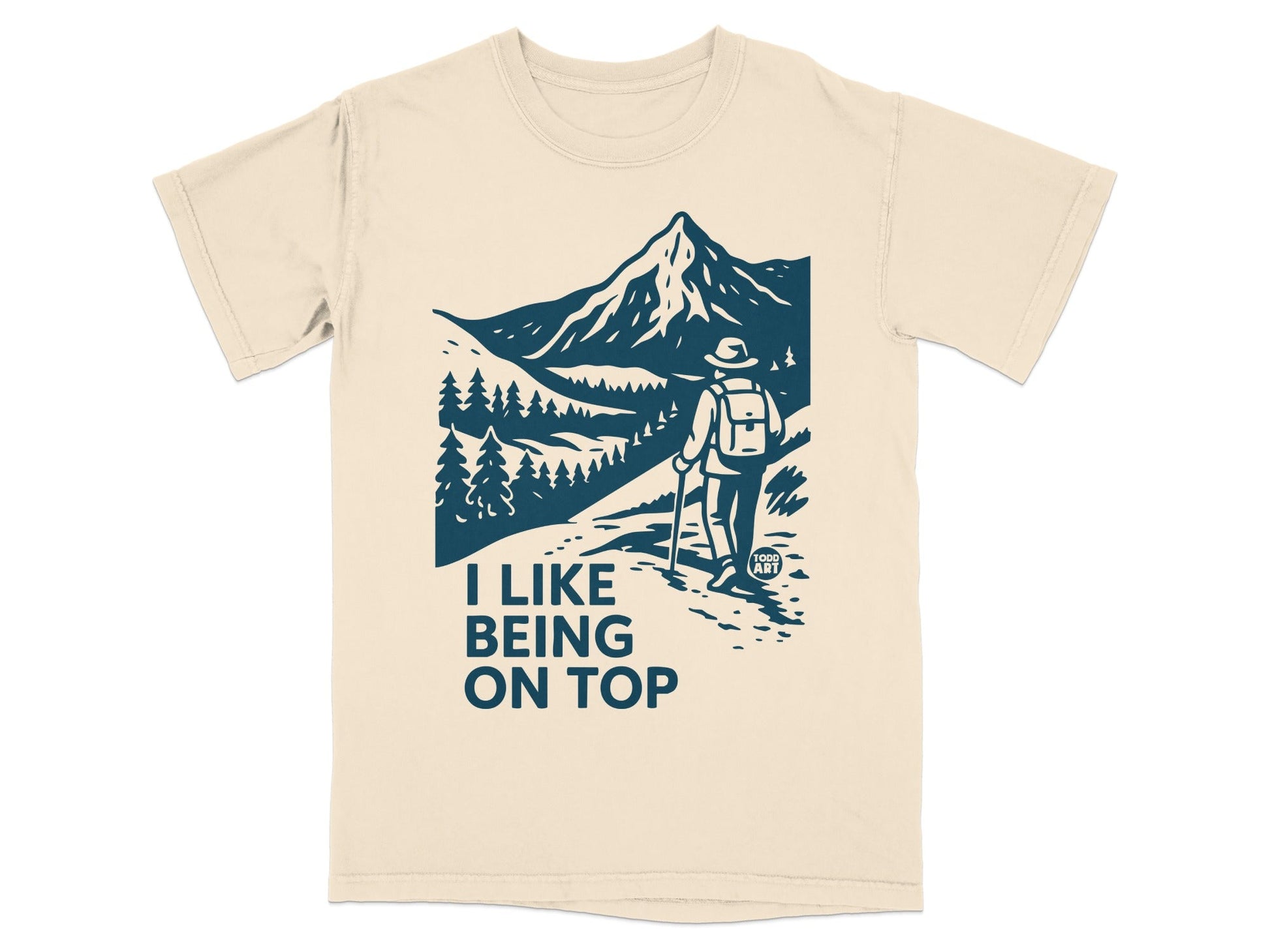 T-shirt with mountain landscape graphic and "I like being on top" text.