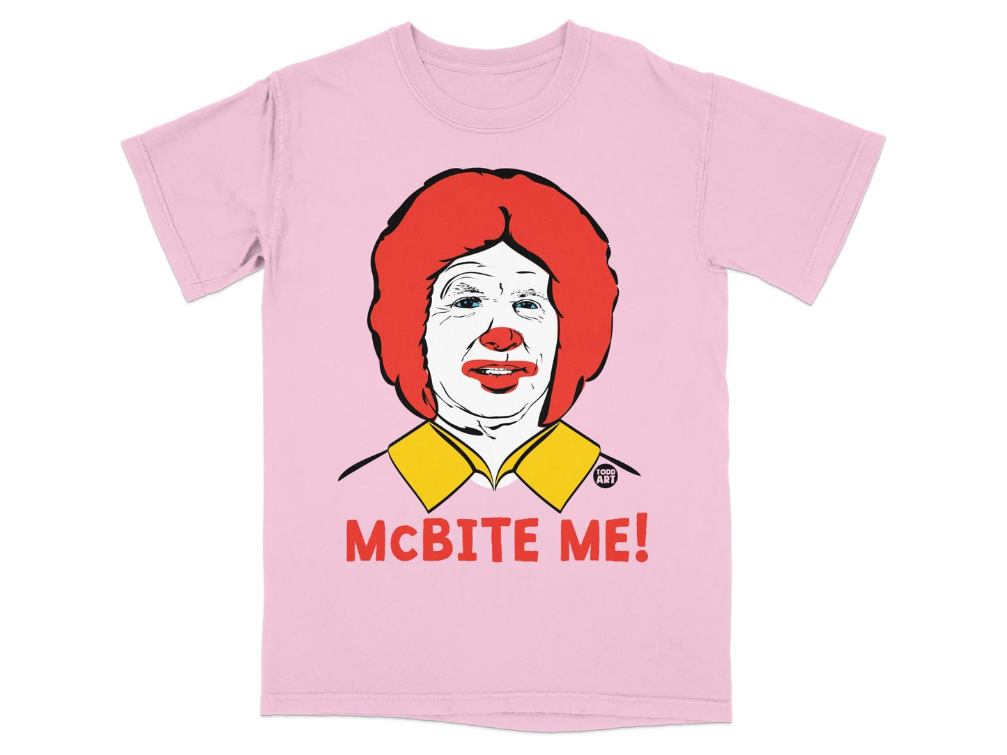 Pink t-shirt with Ronald McDonald illustration and "MCBITE ME!" text.