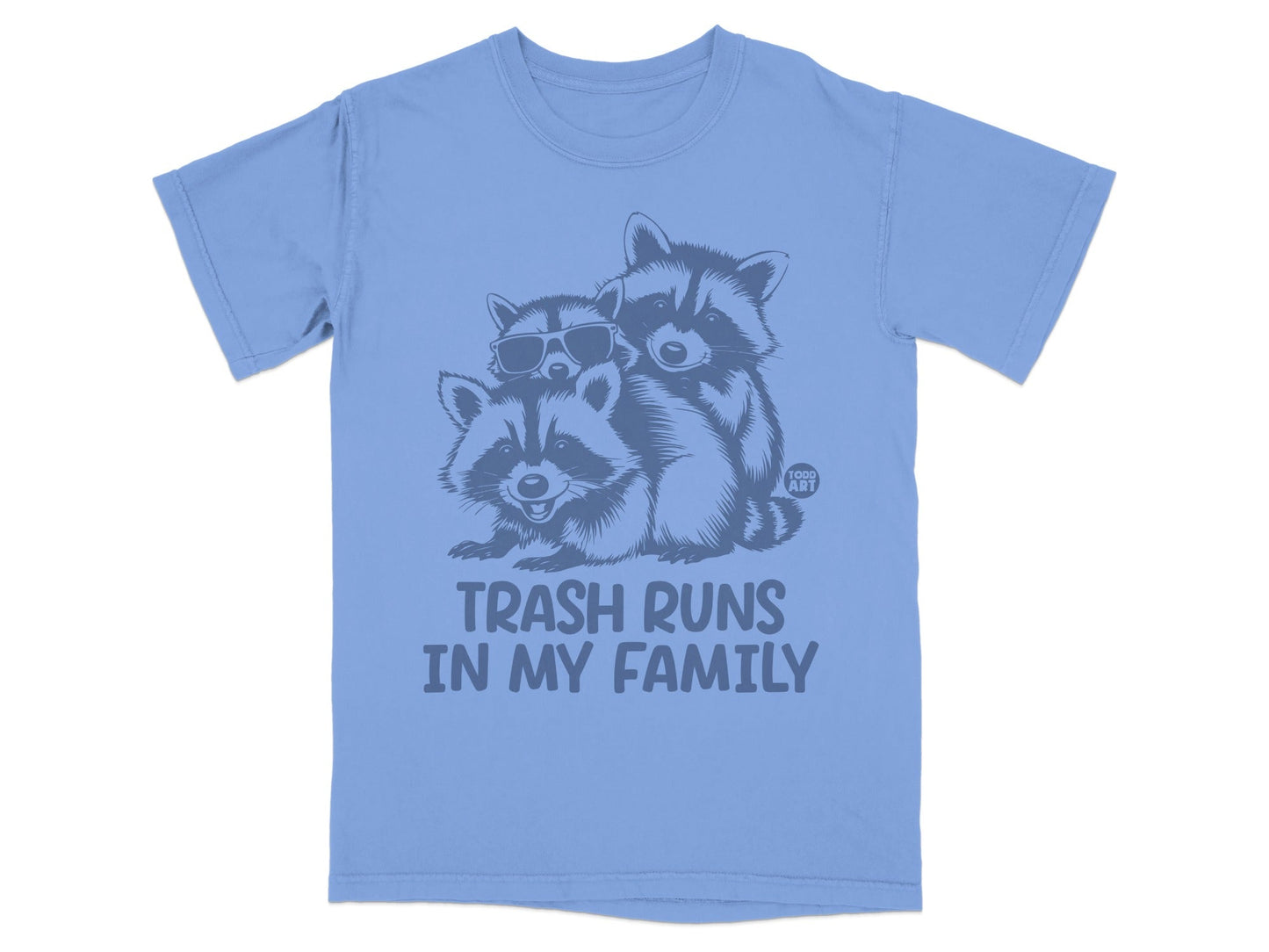 T-shirt with three raccoons wearing sunglasses, text "Trash Runs In My Family".