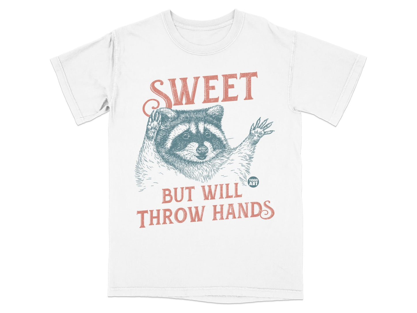 White t-shirt with raccoon saying "Sweet but will throw hands."