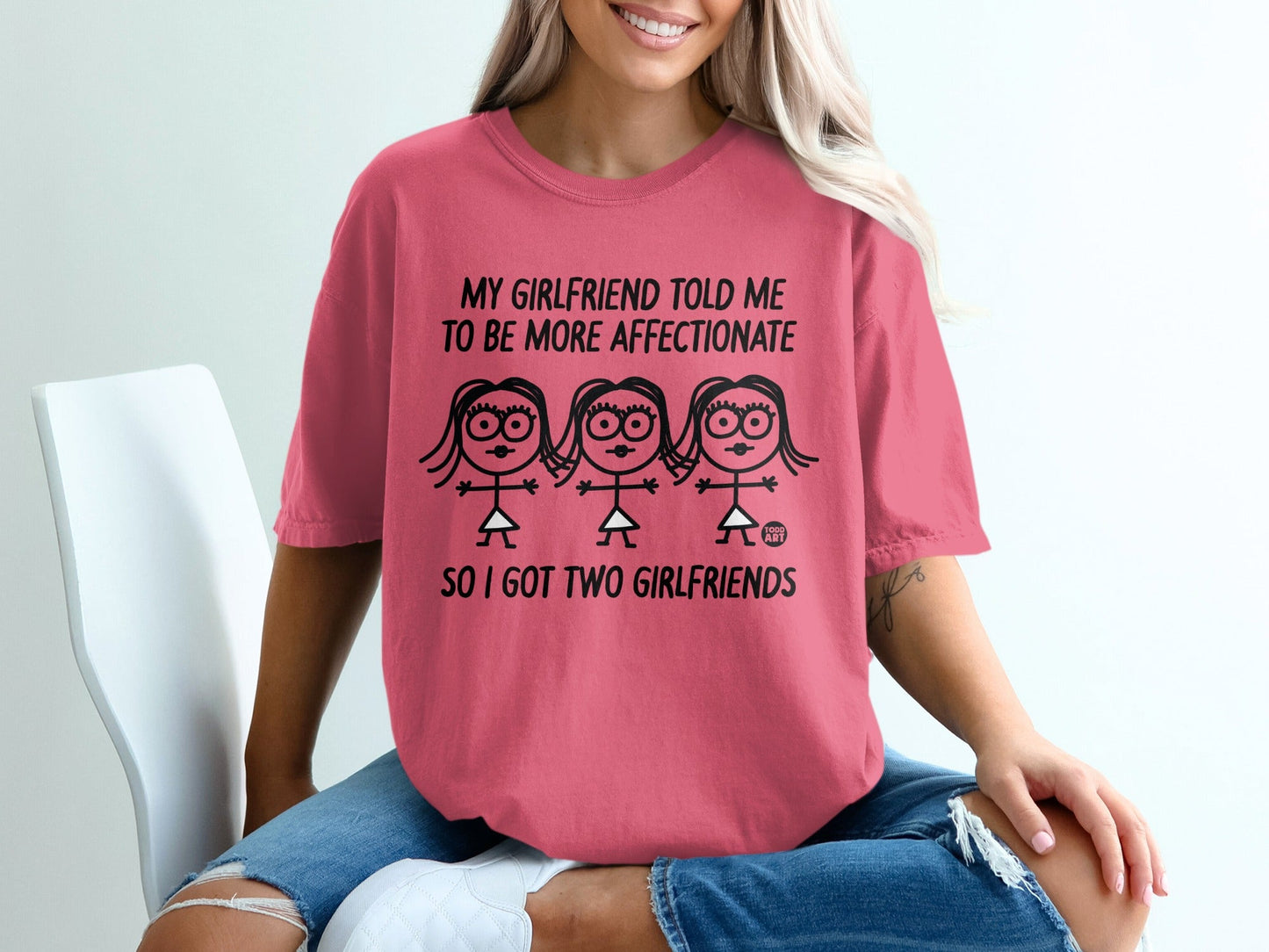 T-shirt with cartoon girls and text: "My girlfriend told me to be more affectionate, so I got two girlfriends."