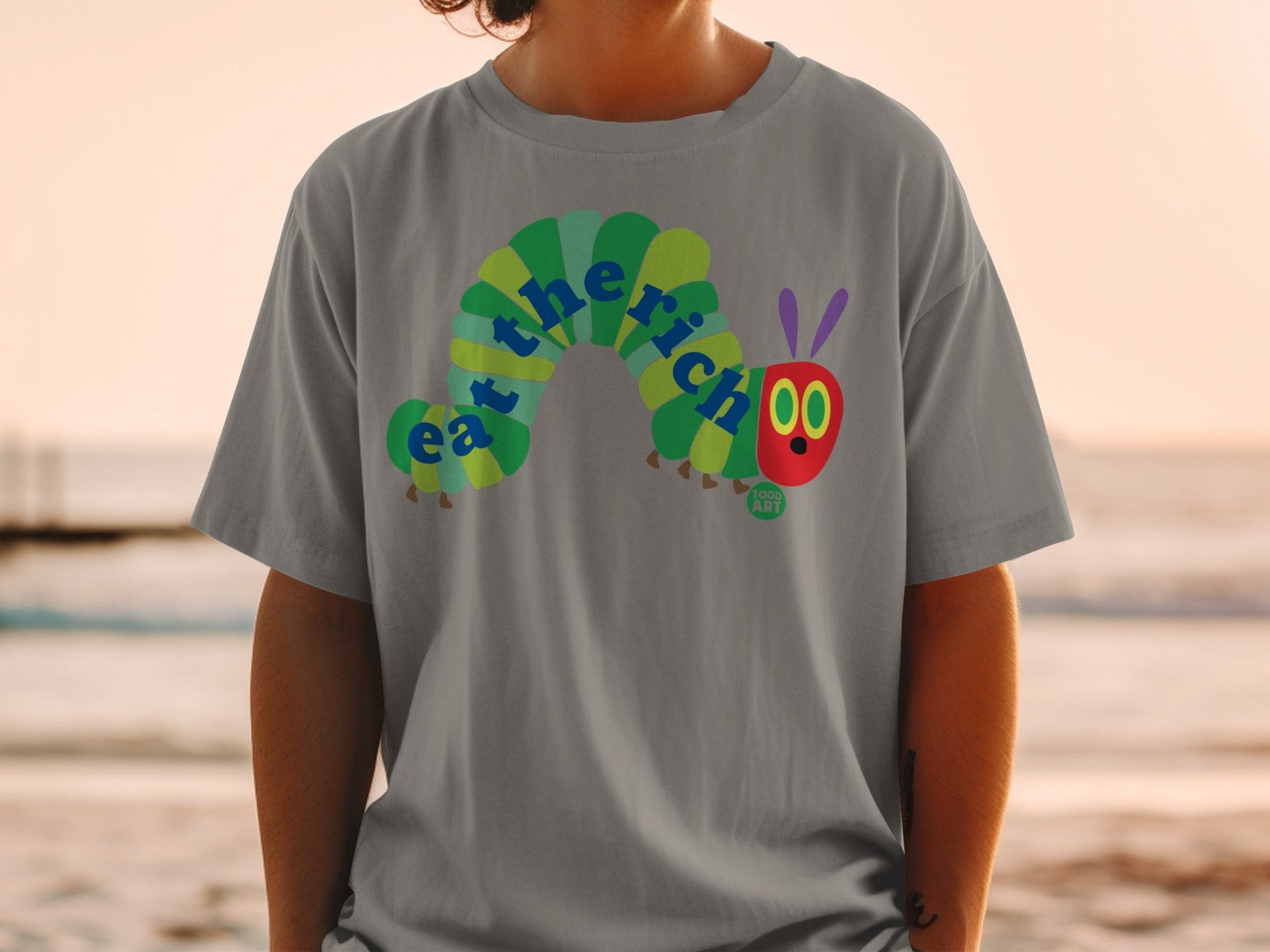 The Very Hungry Caterpillar graphic on a grey t-shirt.