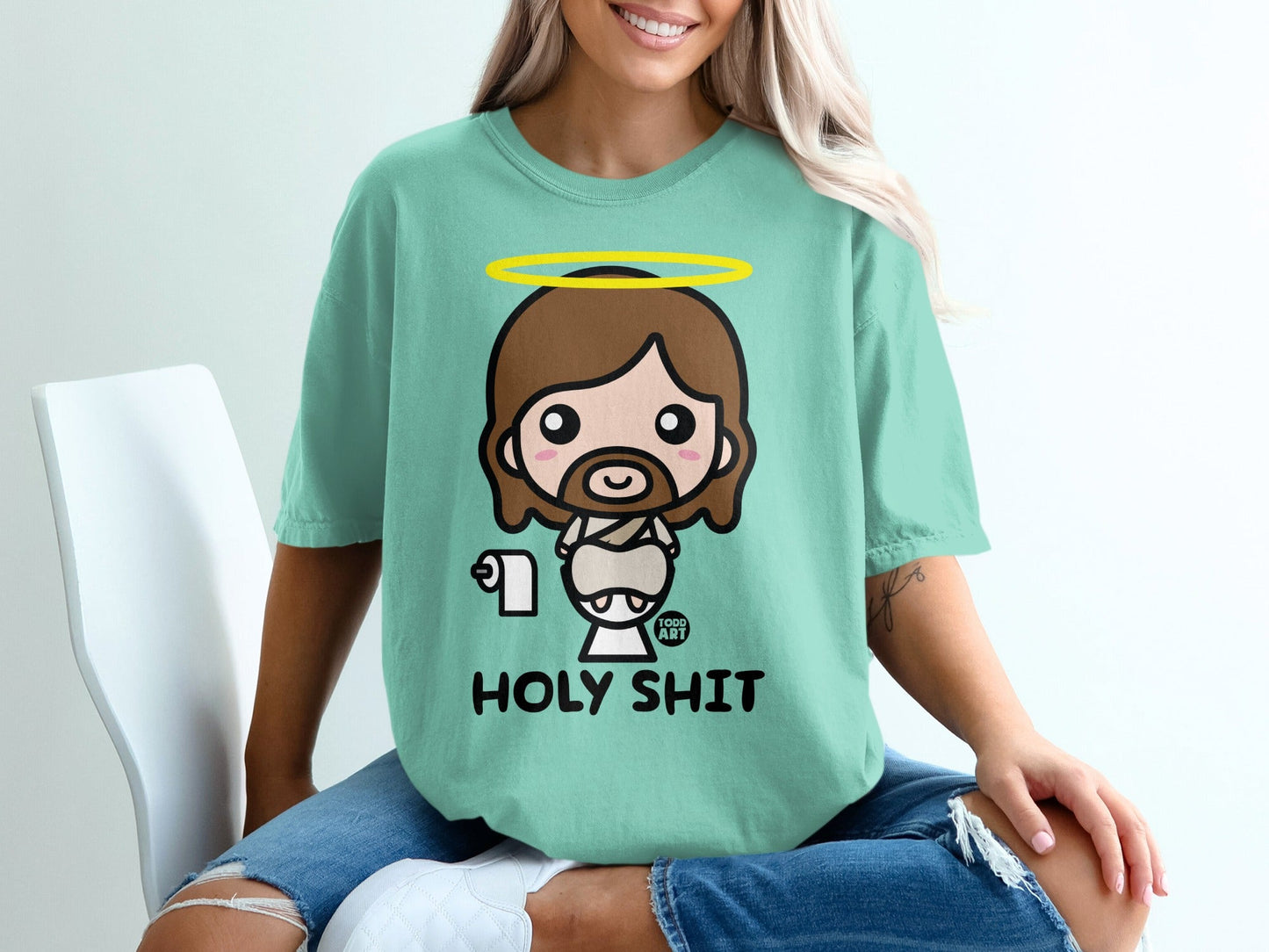 Cartoon Jesus with halo and toilet paper, "HOLY SHIT" text.