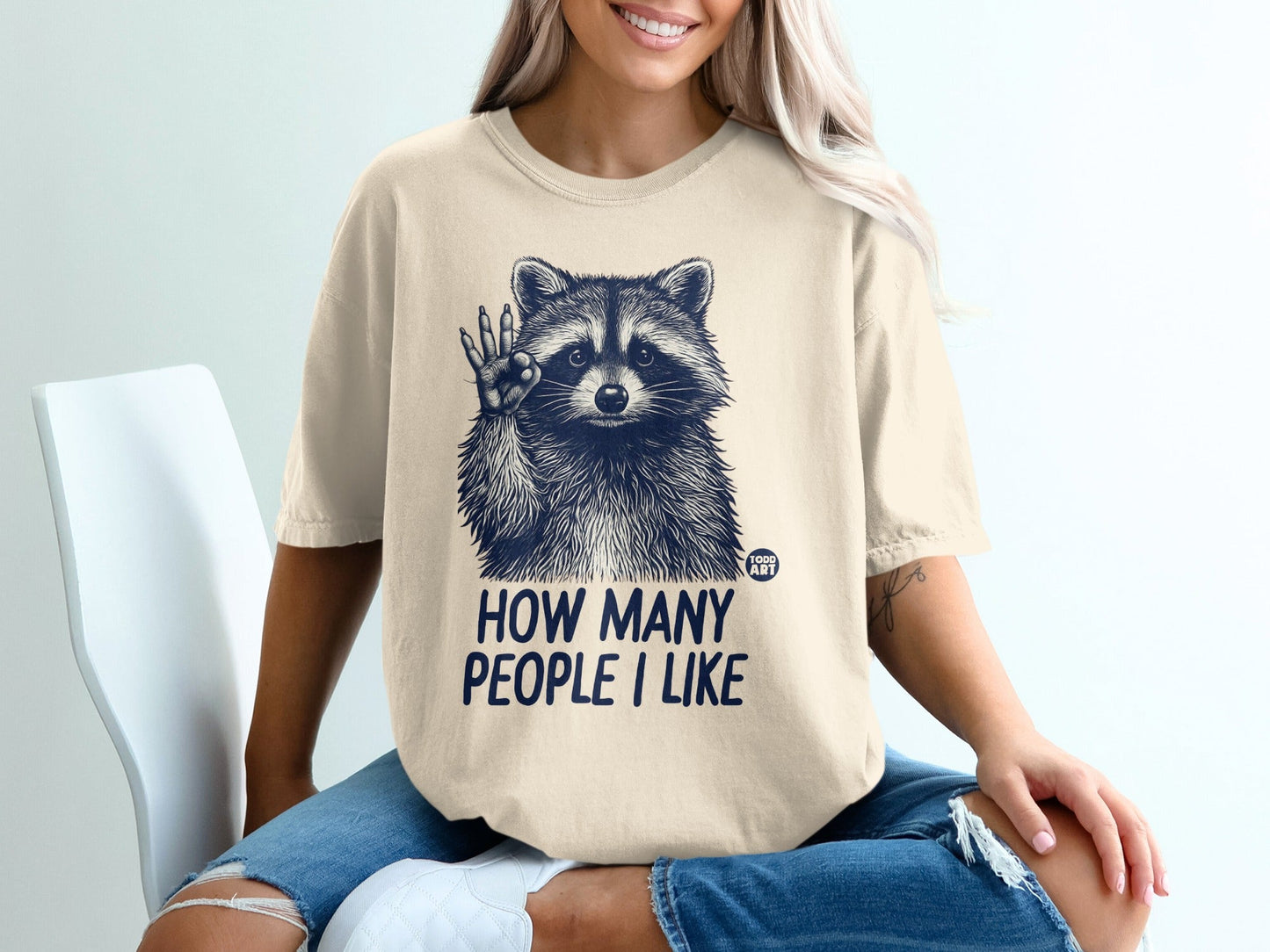 Raccoon giving a high five with text "HOW MANY PEOPLE I LIKE".