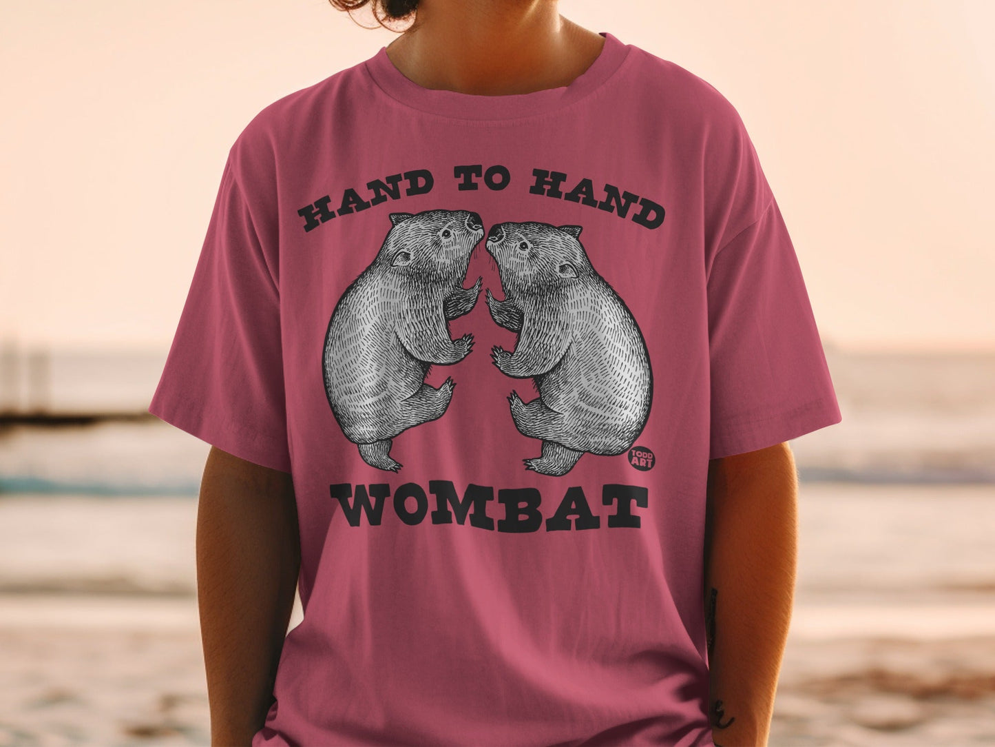 Hand to Hand Wombat Graphic Pink Shirt Design