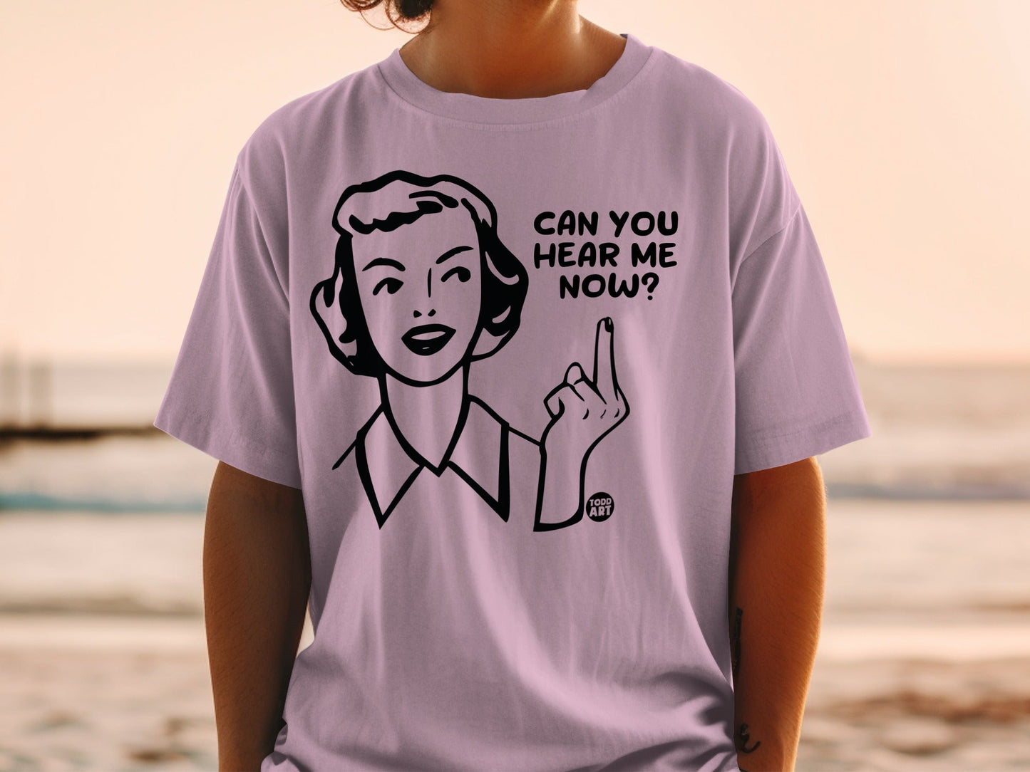 Lavender t-shirt with "Can You Hear Me Now?" text and a woman gesturing.