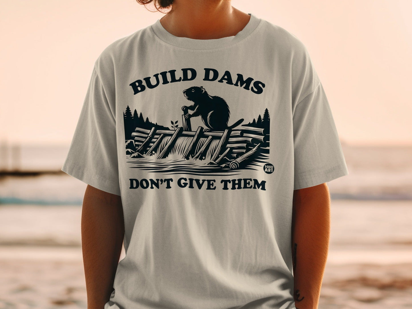 Build Dams Don't Give Them Graphic T-Shirt