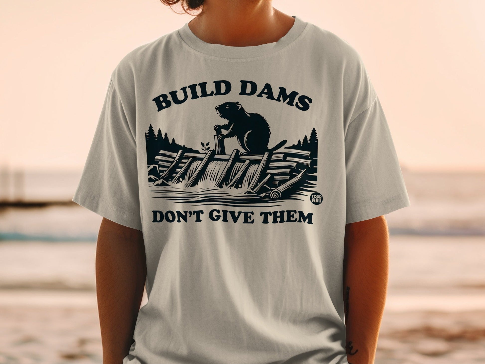 Build Dams Don't Give Them Graphic T-Shirt