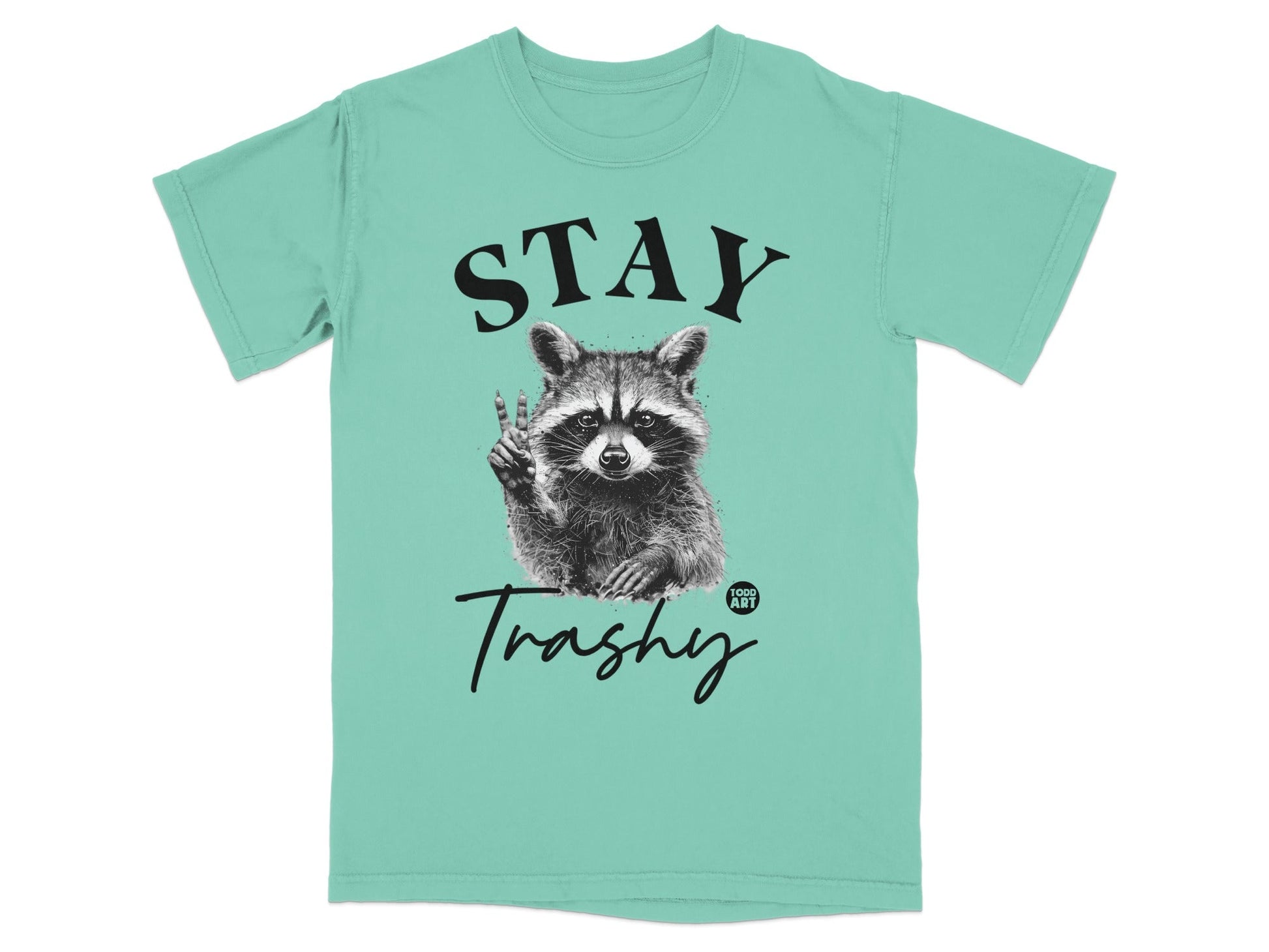 Turquoise t-shirt with black "STAY Trashy" text and a raccoon giving a peace sign.