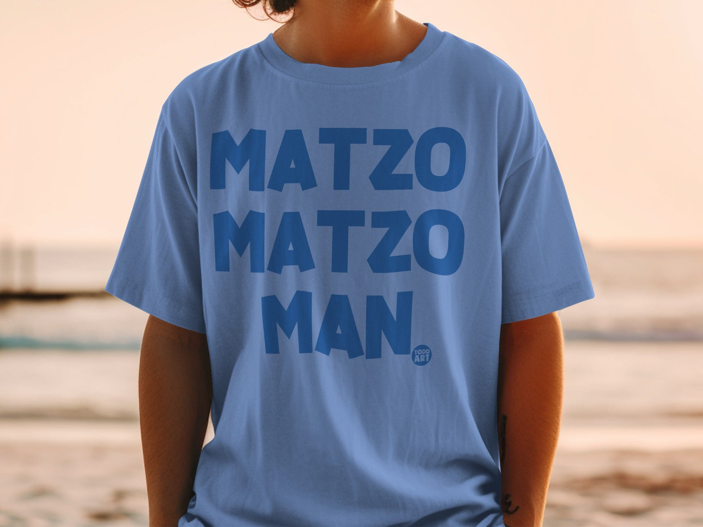 Blue t-shirt with "MATZO MATZO MAN" in large blue letters.