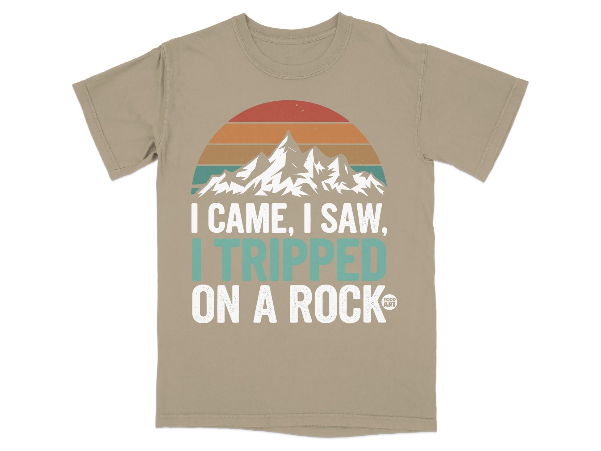 T-shirt with mountains and the text "I Came, I Saw, I Tripped on a Rock."