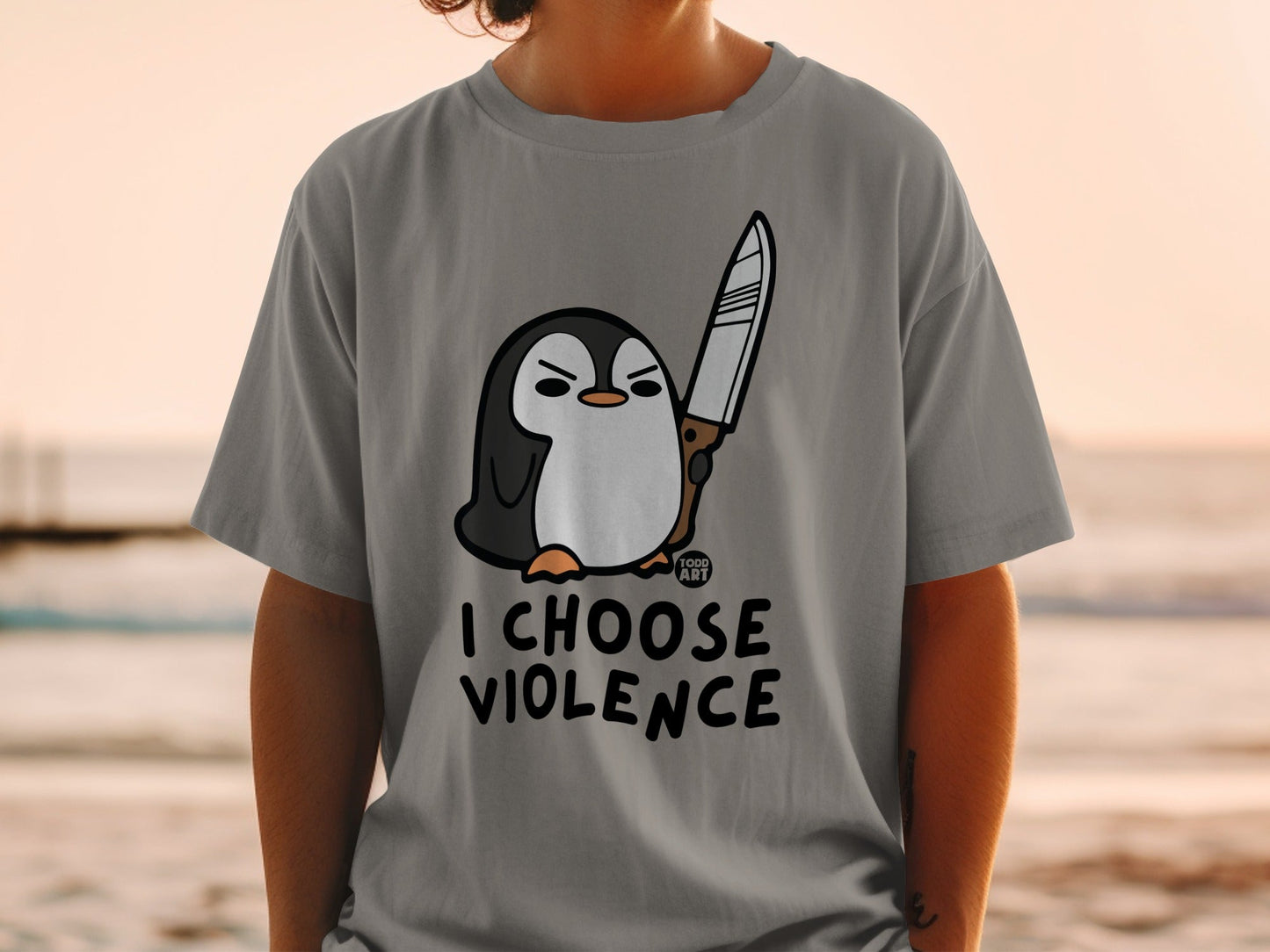 Cartoon penguin holding a knife, with text "I CHOOSE VIOLENCE".