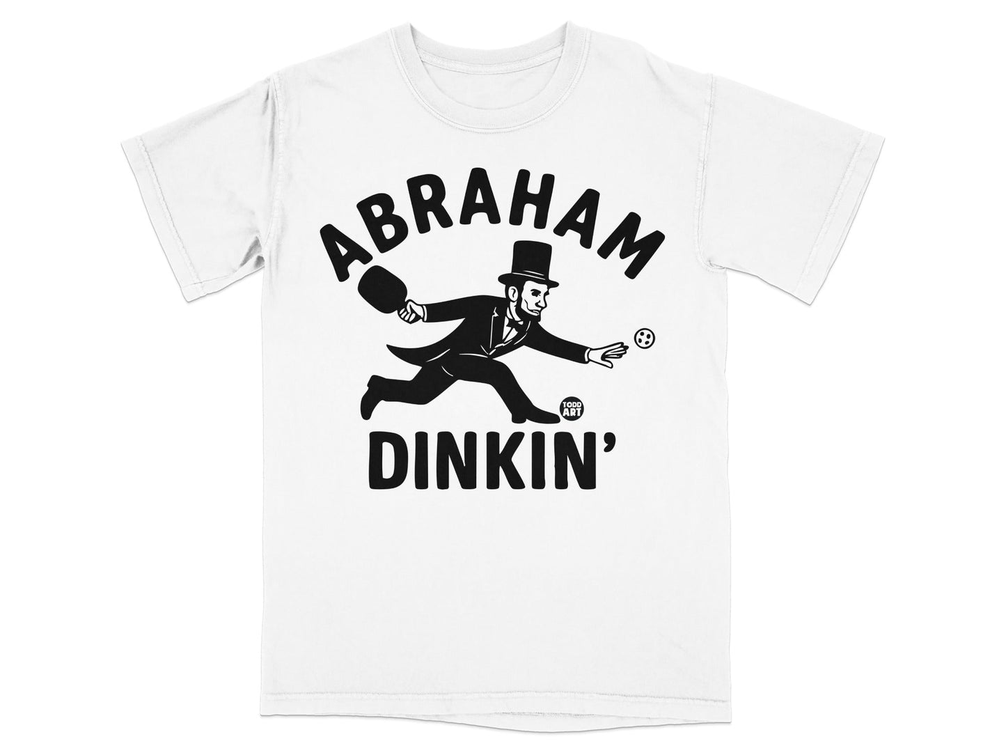 Abraham Lincoln playing pickleball on a white t-shirt.