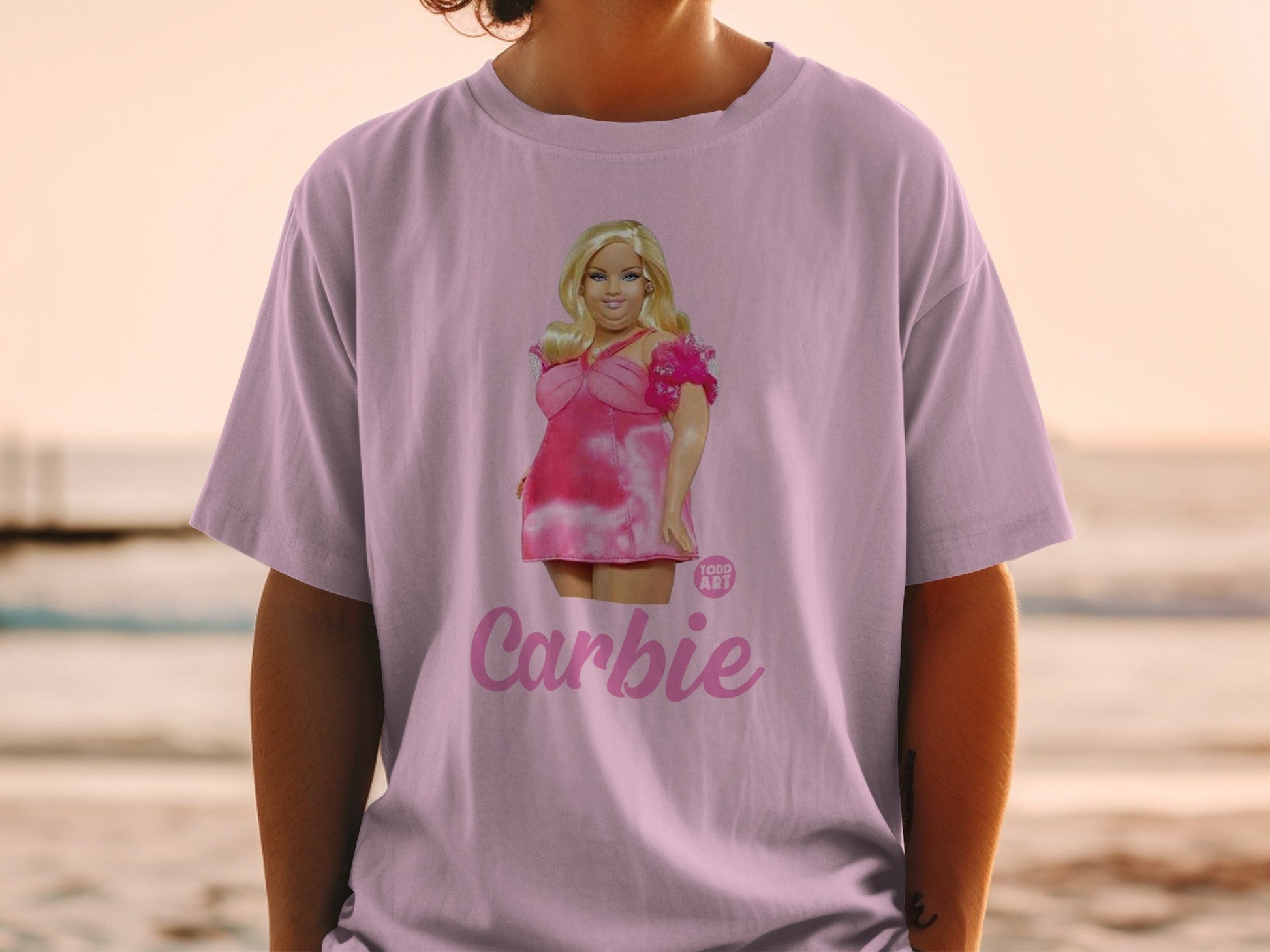 Pink t-shirt with Barbie graphic and "Carbie" text.