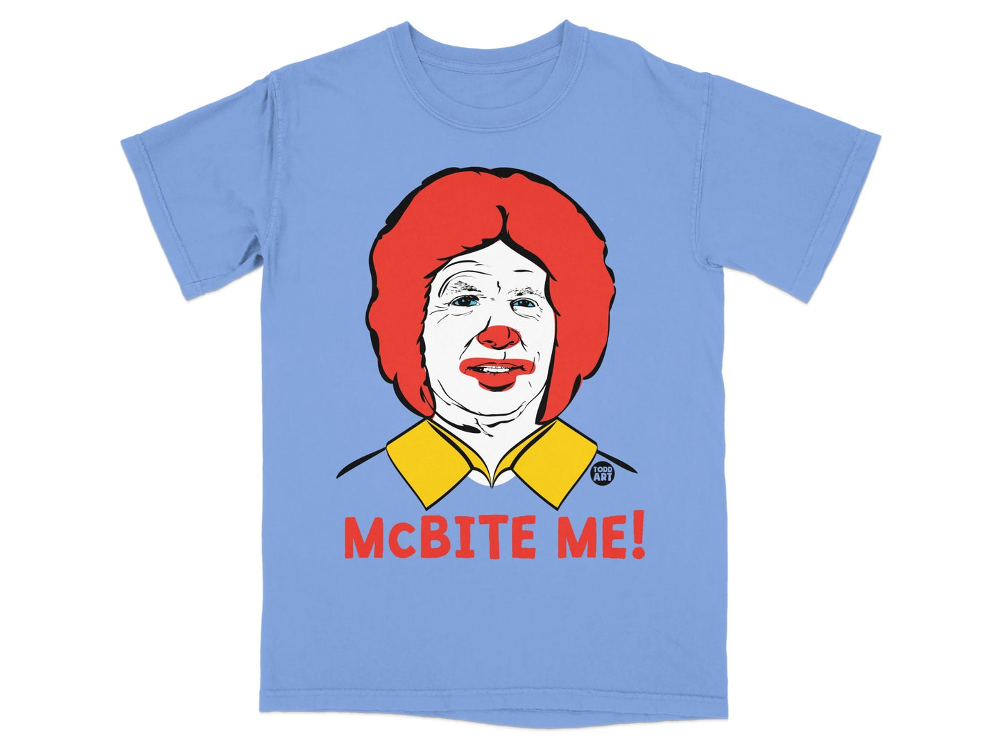 Light blue t-shirt with Ronald McDonald graphic and "McBITE ME!" text.