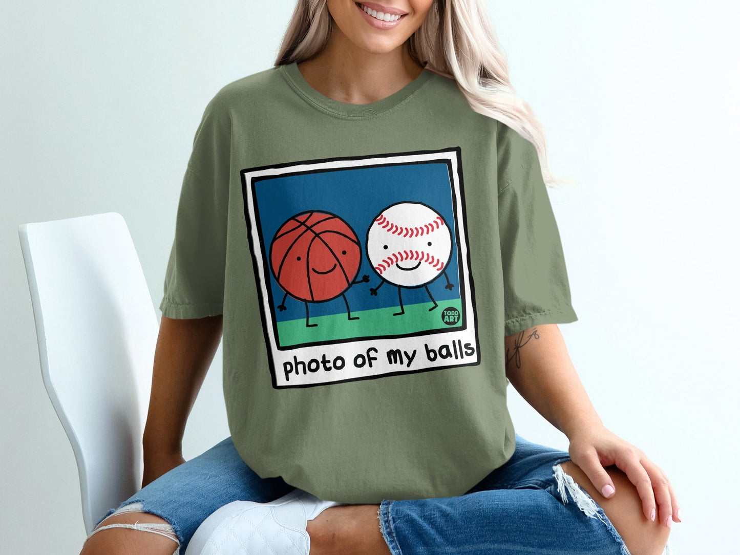 Cartoon basketball and baseball characters holding hands on green field.