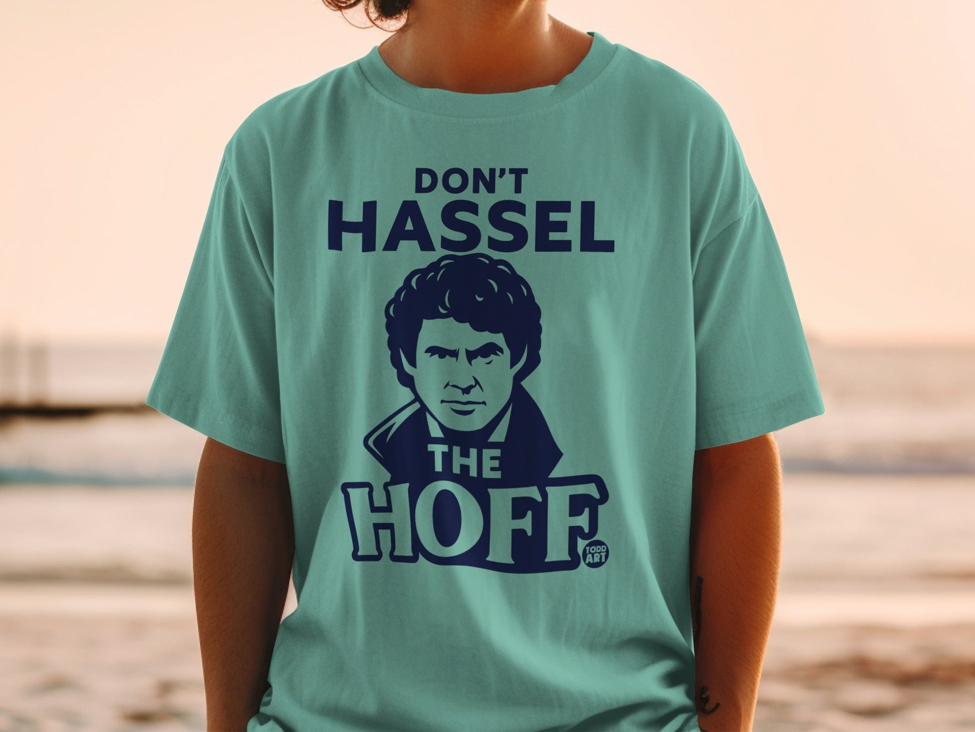 Teal t-shirt with "Don't Hassel The Hoff" and David Hasselhoff graphic.