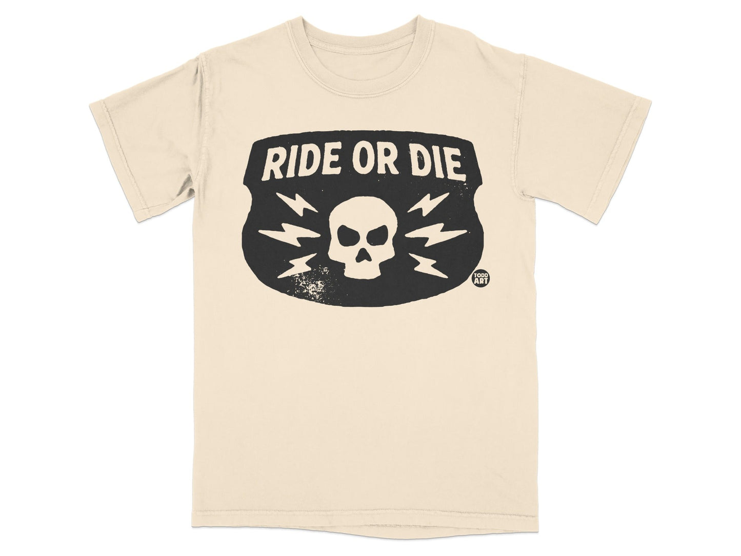 Cream t-shirt with black "RIDE OR DIE" text and skull graphic.