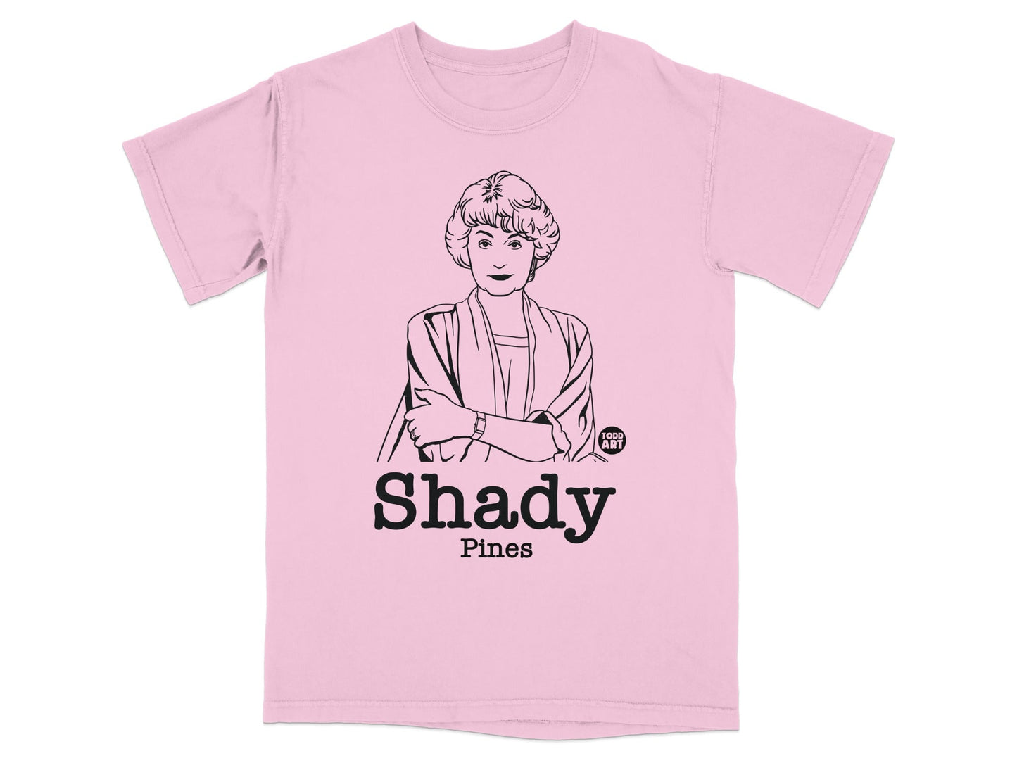 Pink t-shirt with a black line drawing of a woman and "Shady Pines" text.