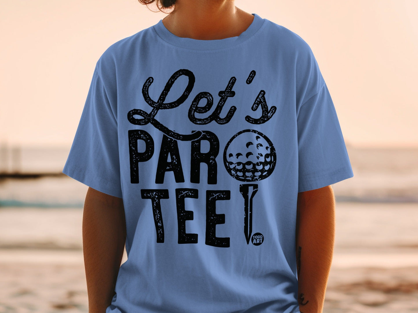 Light blue t-shirt with "Let's PAR tee!" and a golf ball design.