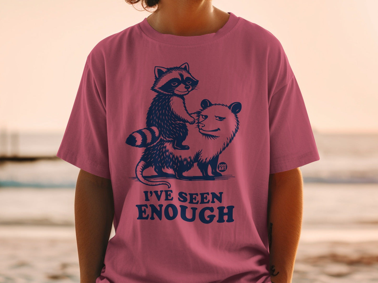 T-shirt with raccoon riding opossum and text "I'VE SEEN ENOUGH".