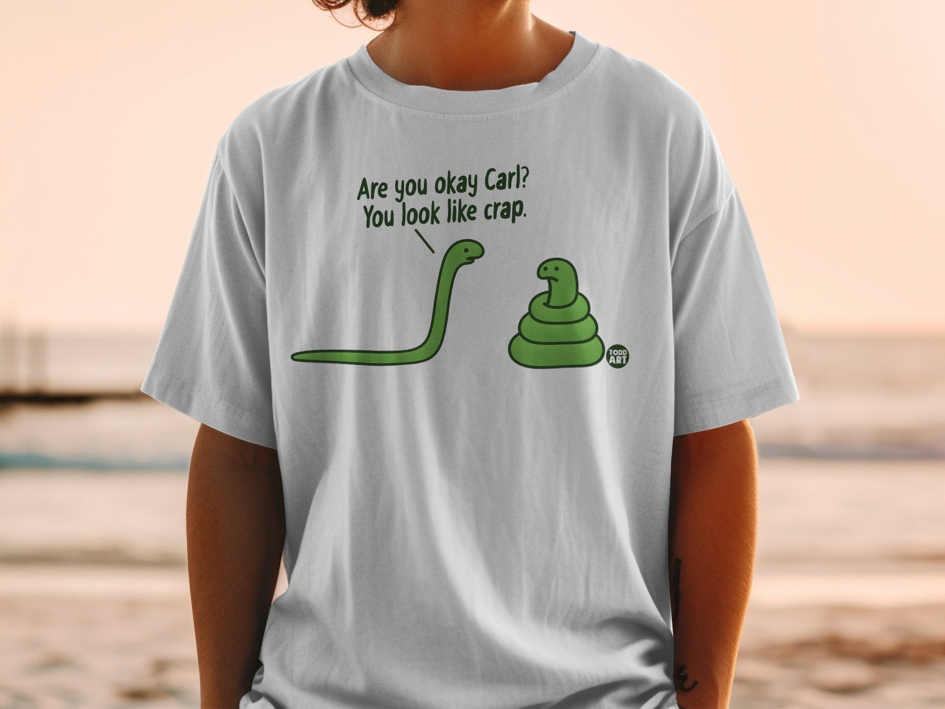 Green snake asks a coiled snake, "Are you okay Carl? You look like crap."