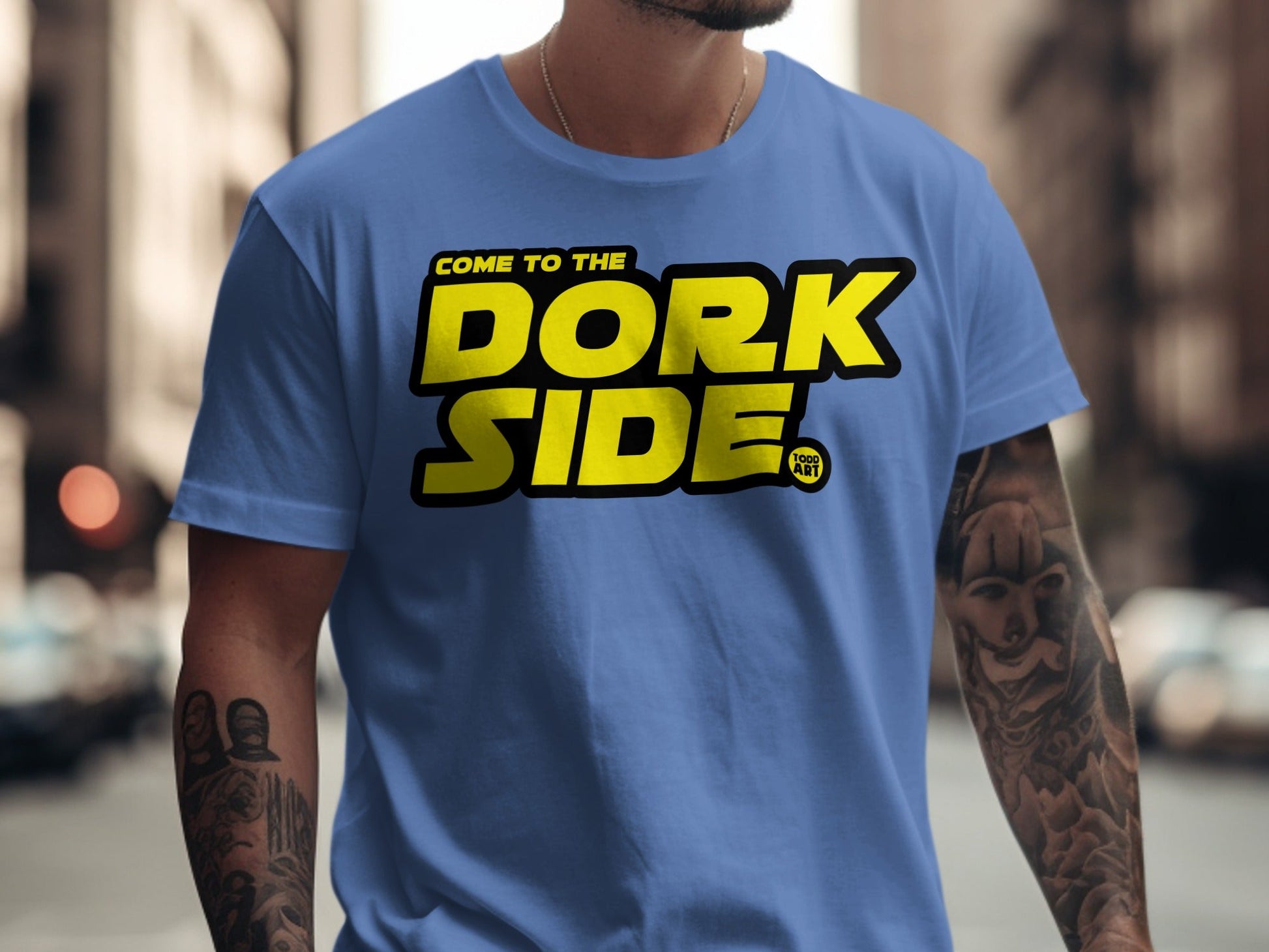 Blue t-shirt with "Come to the DORK SIDE" and "TEST ART" logos.