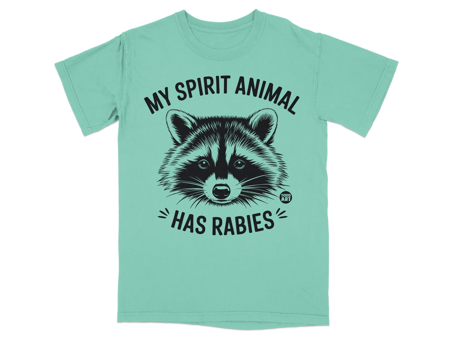 T-shirt with raccoon graphic and text "MY SPIRIT ANIMAL HAS RABIES".
