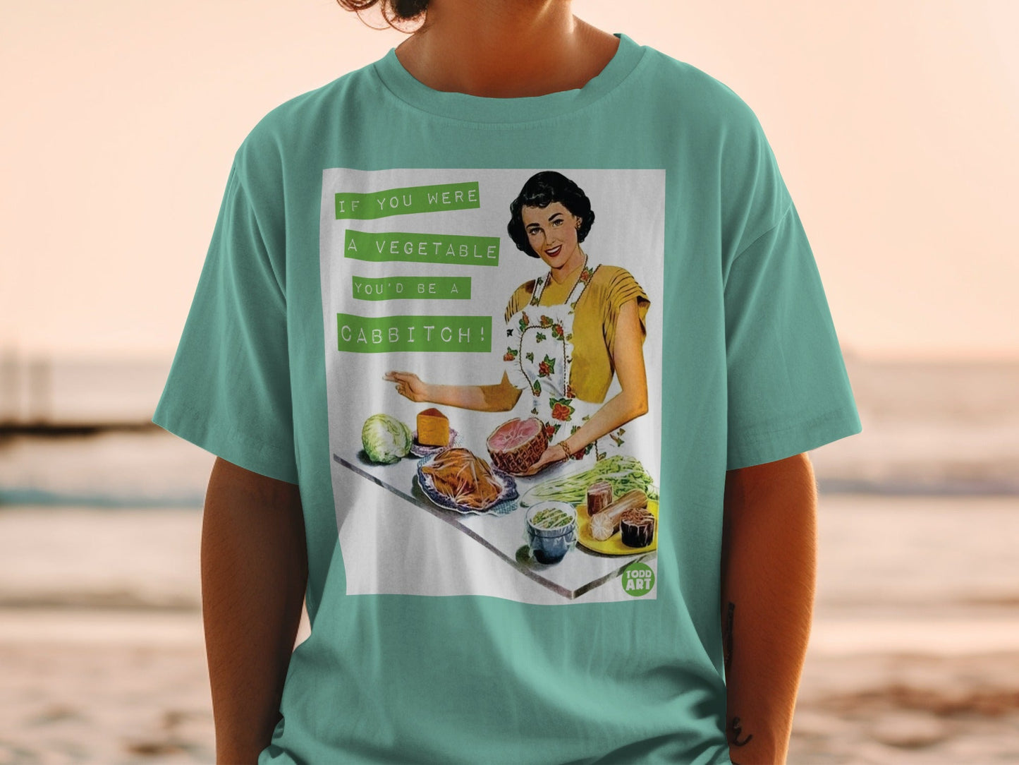 T-shirt with vintage illustration and text "If you were a vegetable, you'd be a cabbitch!"