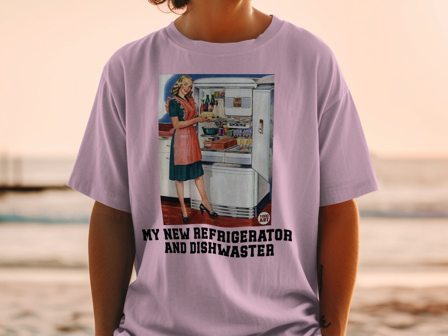 T-shirt graphic: woman in kitchen with refrigerator and dishwasher.