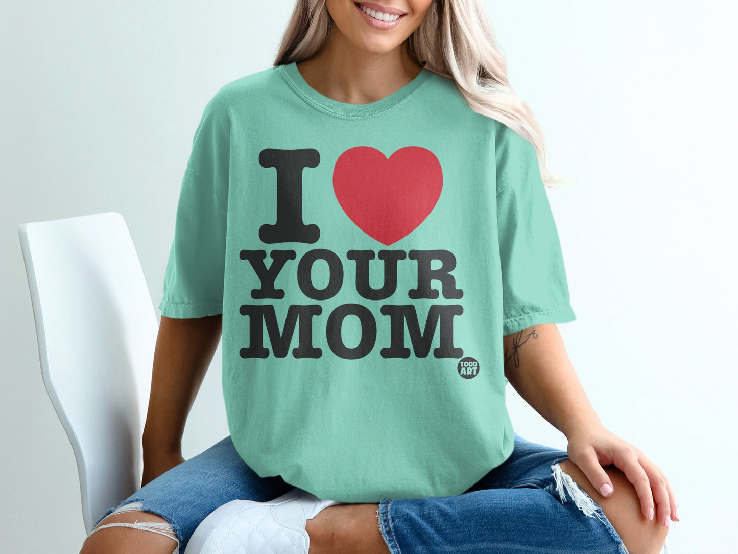 Mint green t-shirt with "I ‚ù§Ô∏è YOUR MOM" and "TODD ART" text.
