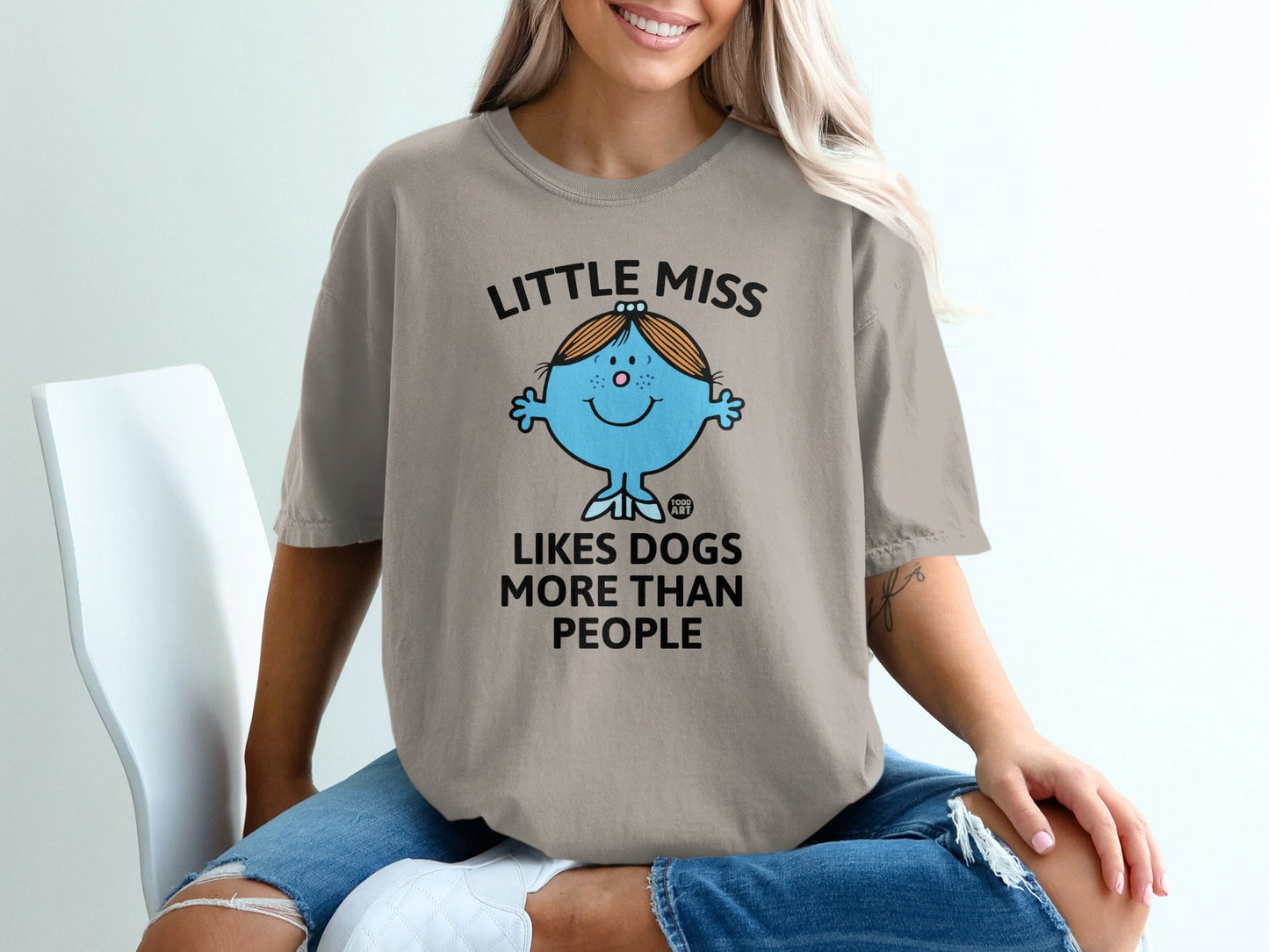 Little Miss Likes Dogs More Than People graphic t-shirt.