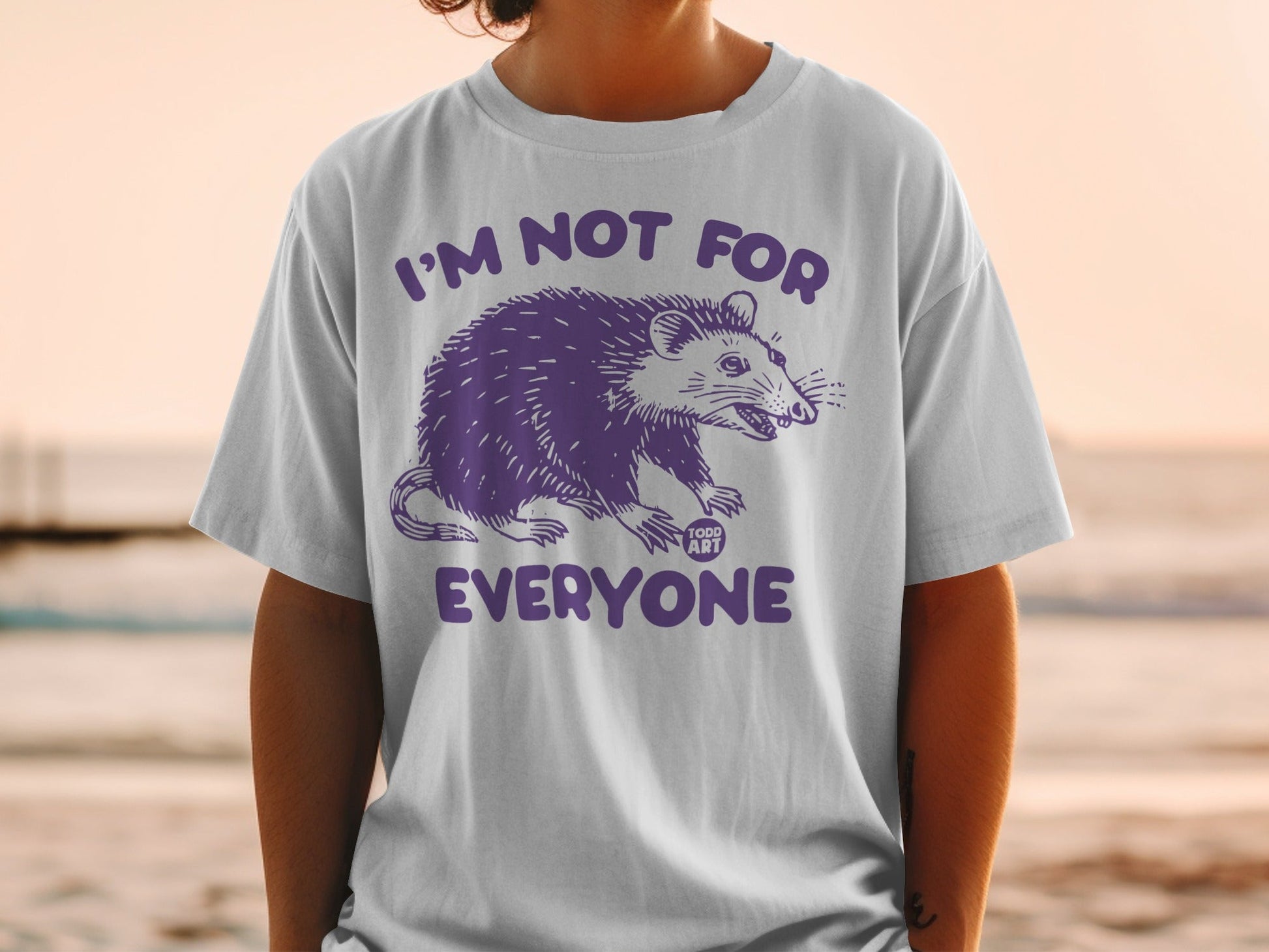 Gray t-shirt with purple opossum graphic and text "I'M NOT FOR EVERYONE".