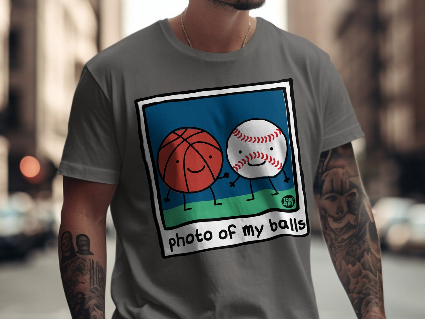 Cartoon basketball and baseball holding hands, text "photo of my balls".