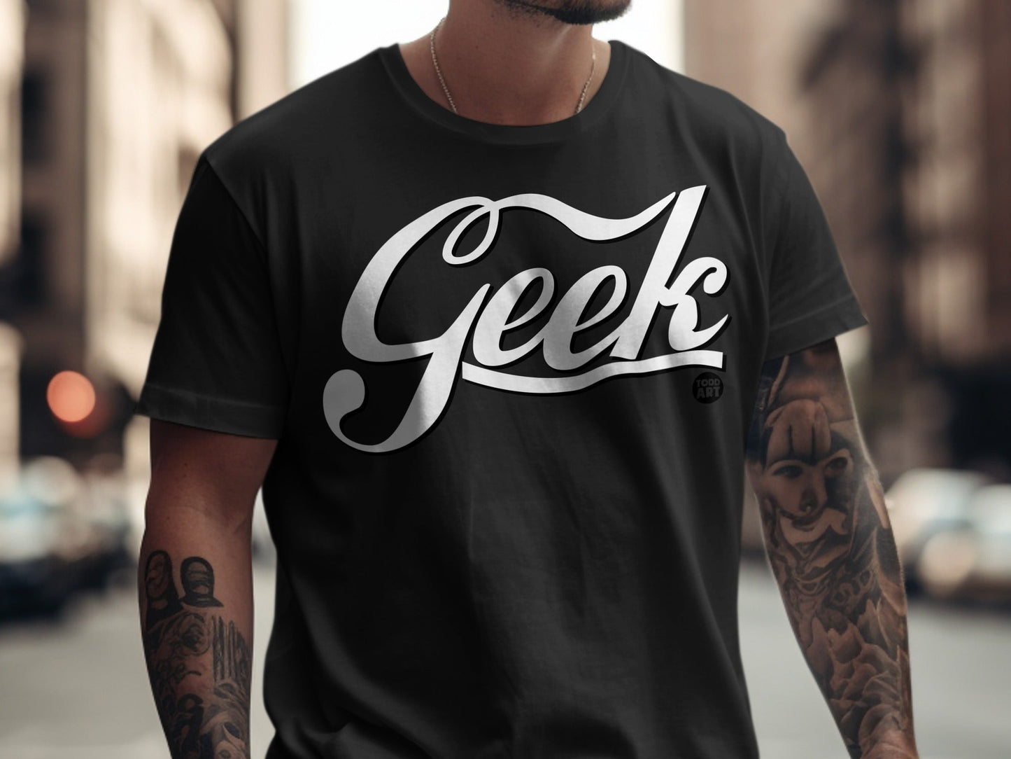 Black t-shirt with white "Geek" graphic and small "Good Vibes" text.