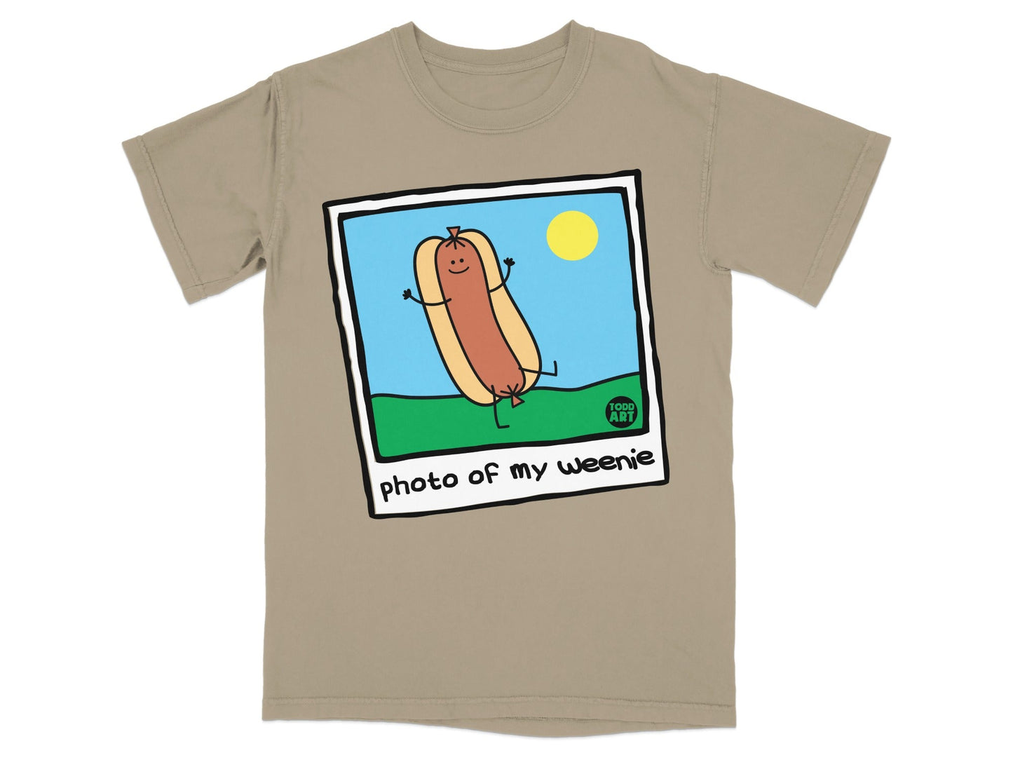 T-shirt with cartoon hot dog saying "photo of my weenie" and sun.