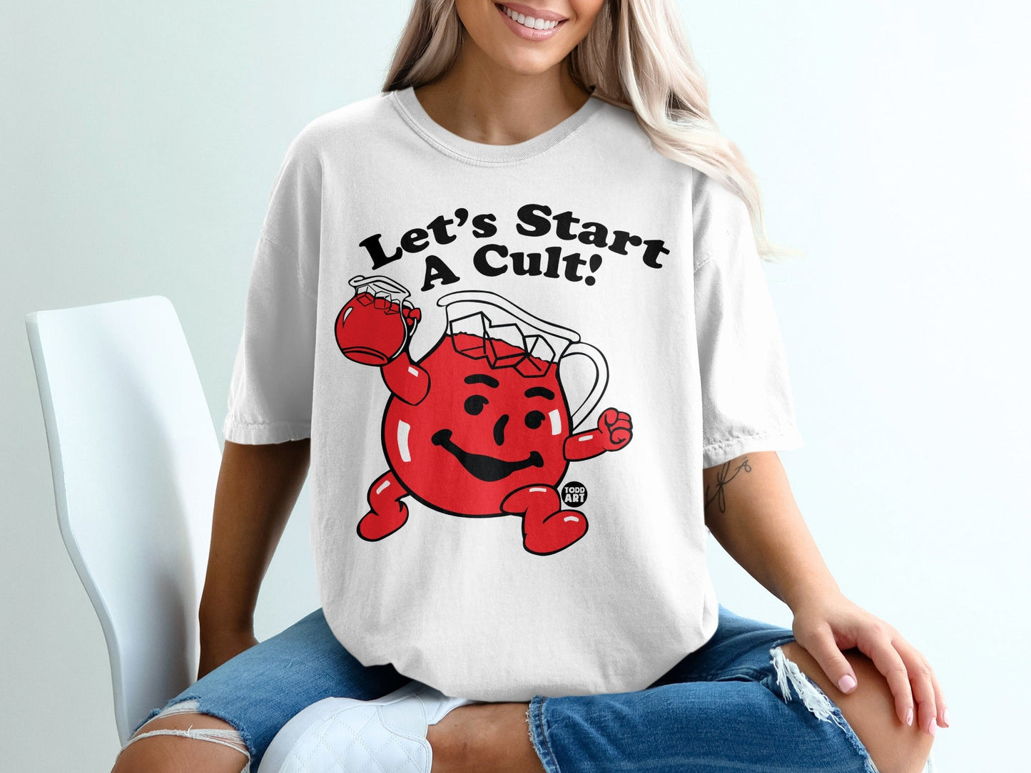 Kool-Aid Man on white t-shirt, "Let's Start A Cult!" text.