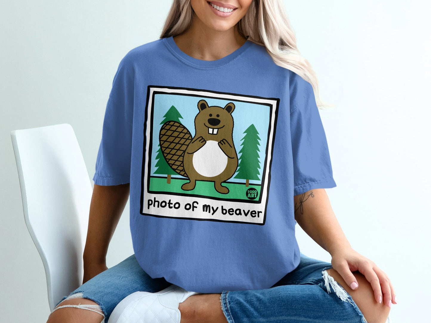 Cartoon beaver in a picture frame with text "Photo of my beaver."
