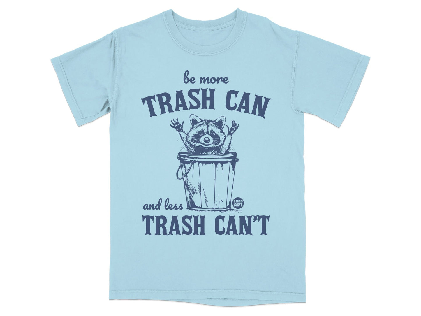 Light blue t-shirt with raccoon and "Be More Trash Can and Less Trash Can't" text.