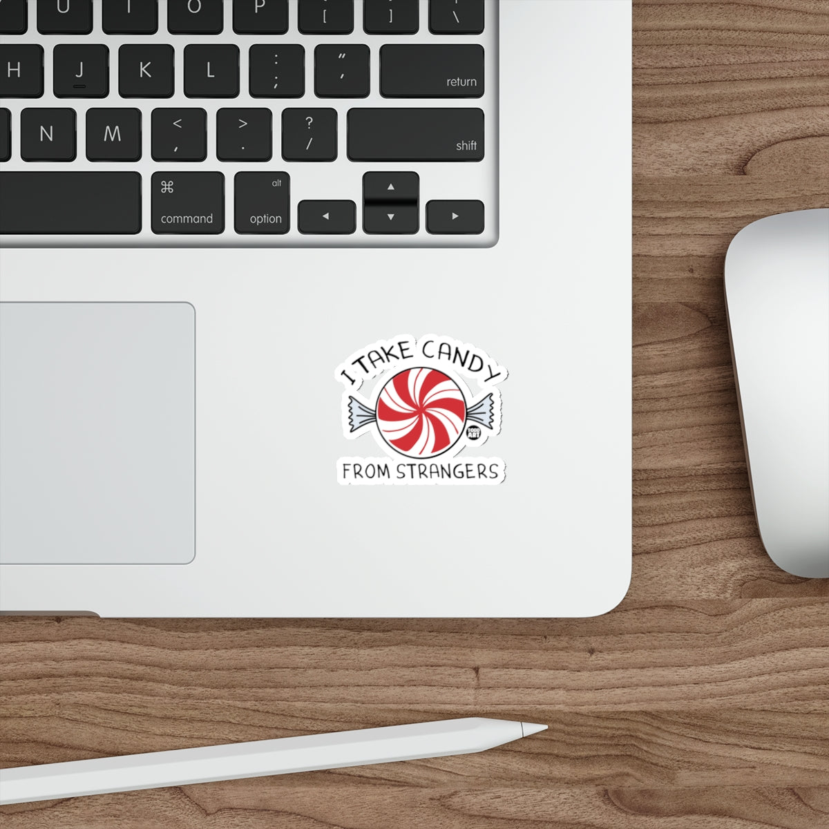 Sticker with red and white swirled candy and text "I TAKE CANDY FROM STRANGERS".