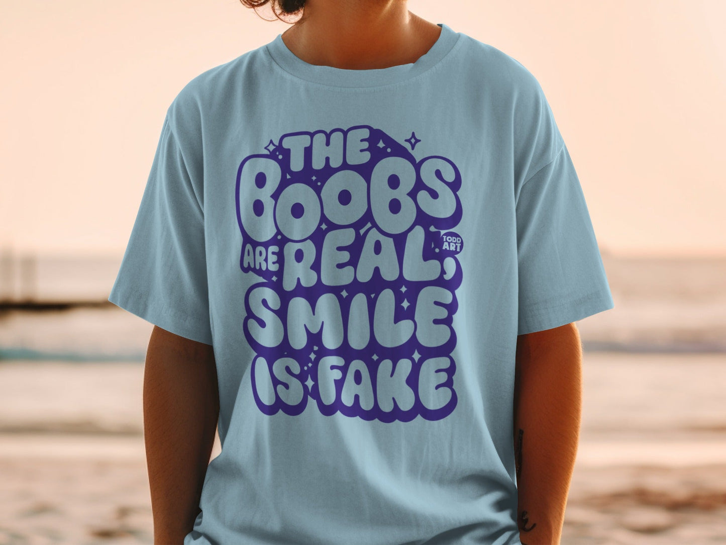 The Boobs Are Real Smile Is Fake Graphic Tee