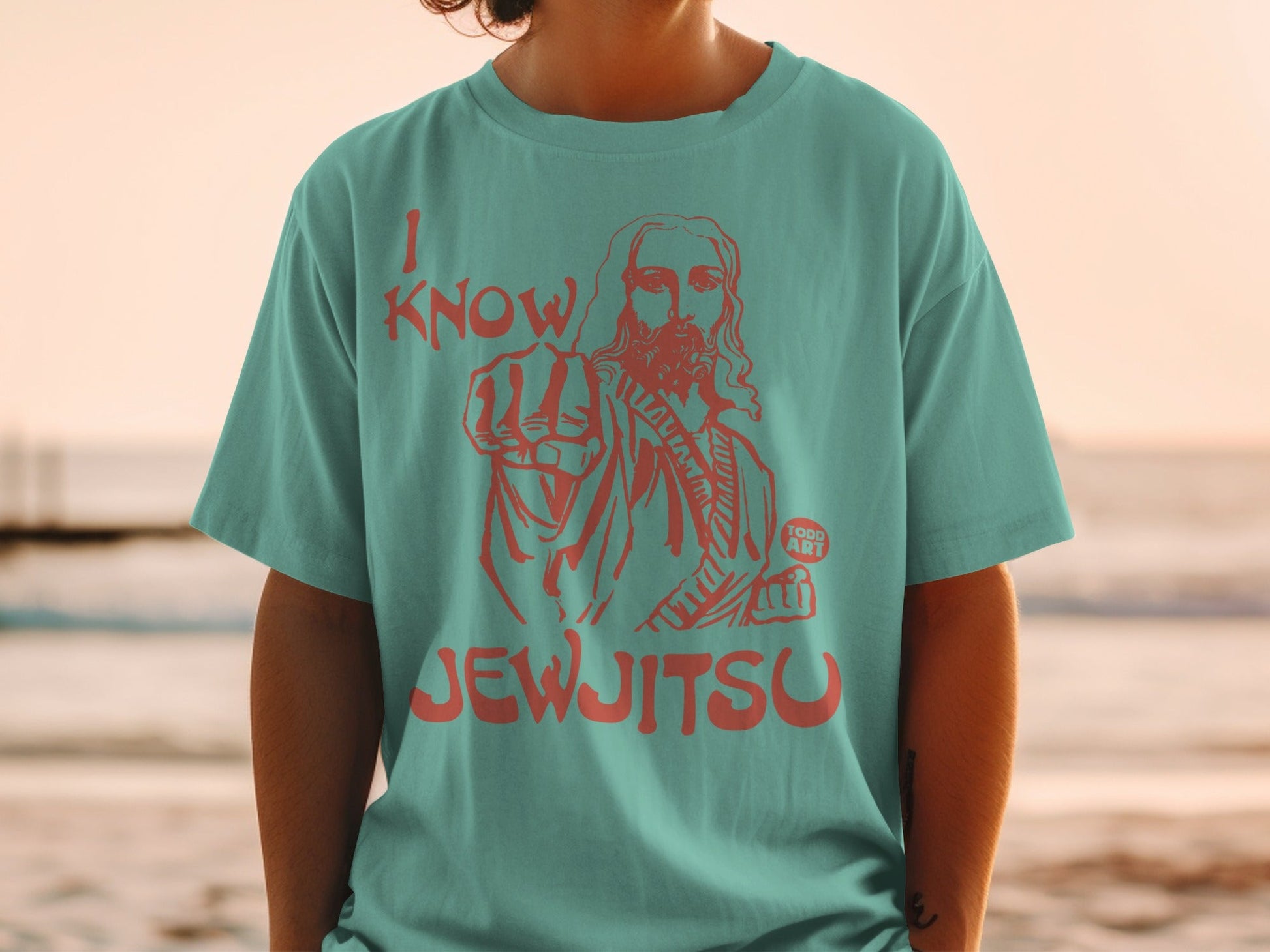 T-shirt with Jesus graphic and text "I KNOW JEWJITSU" and "TODD ART".
