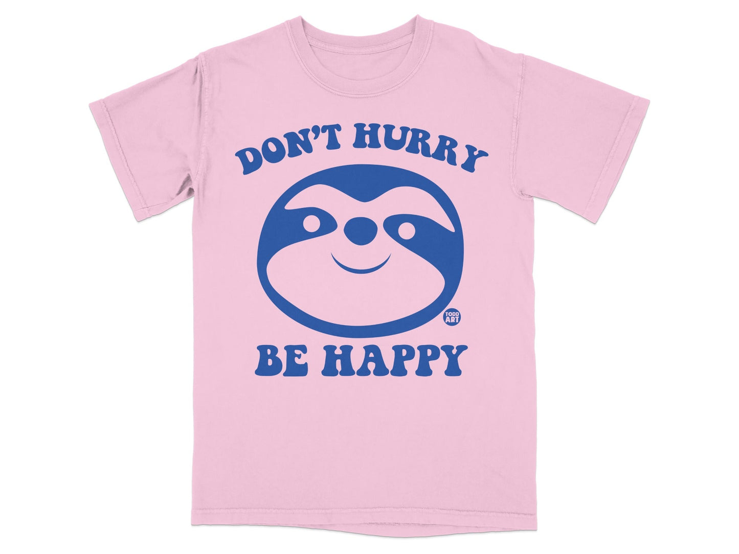 Pink t-shirt with blue "Don't Hurry Be Happy" text and sloth graphic.