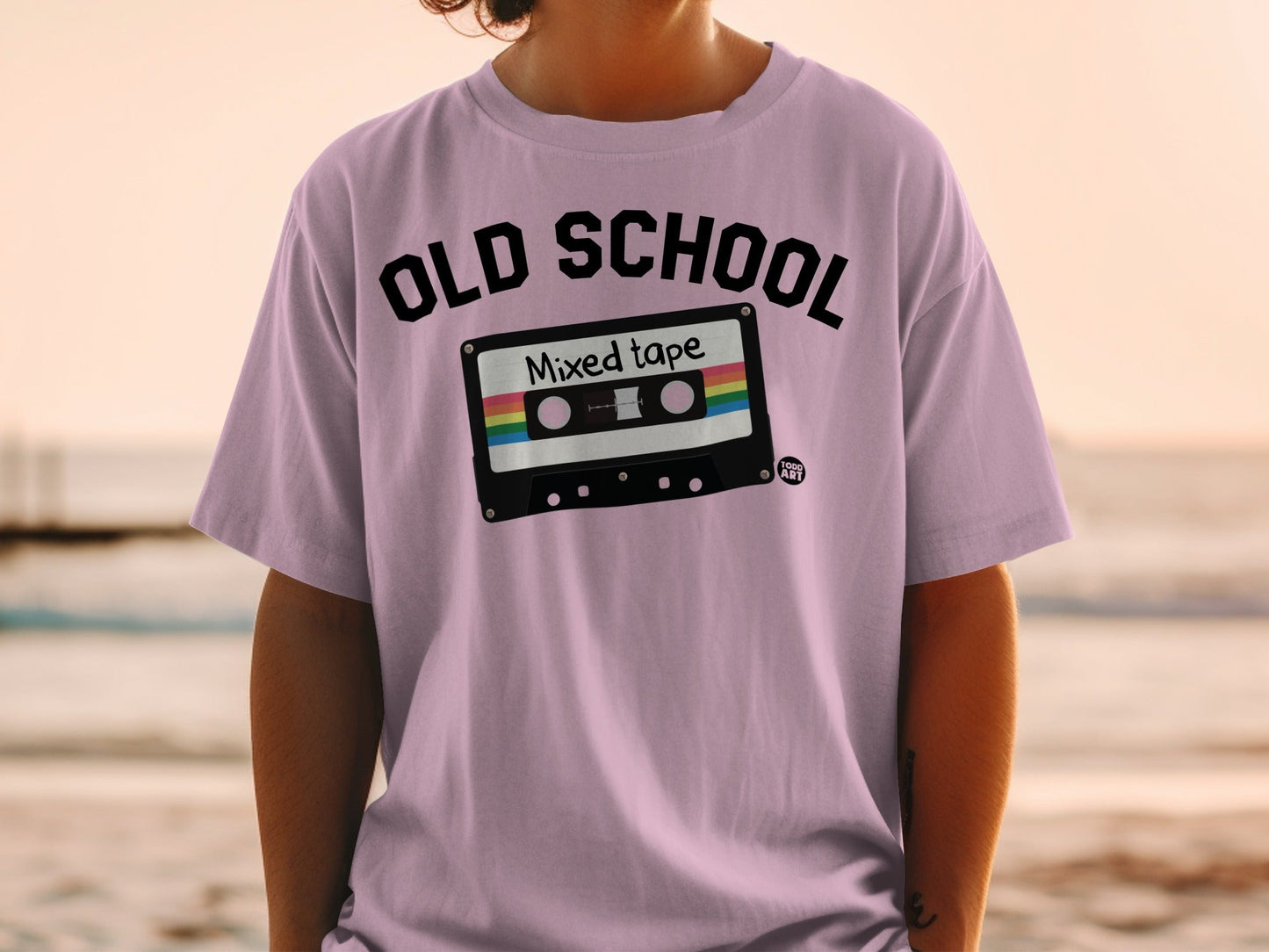 Lavender t-shirt with "OLD SCHOOL Mixed tape" graphic.