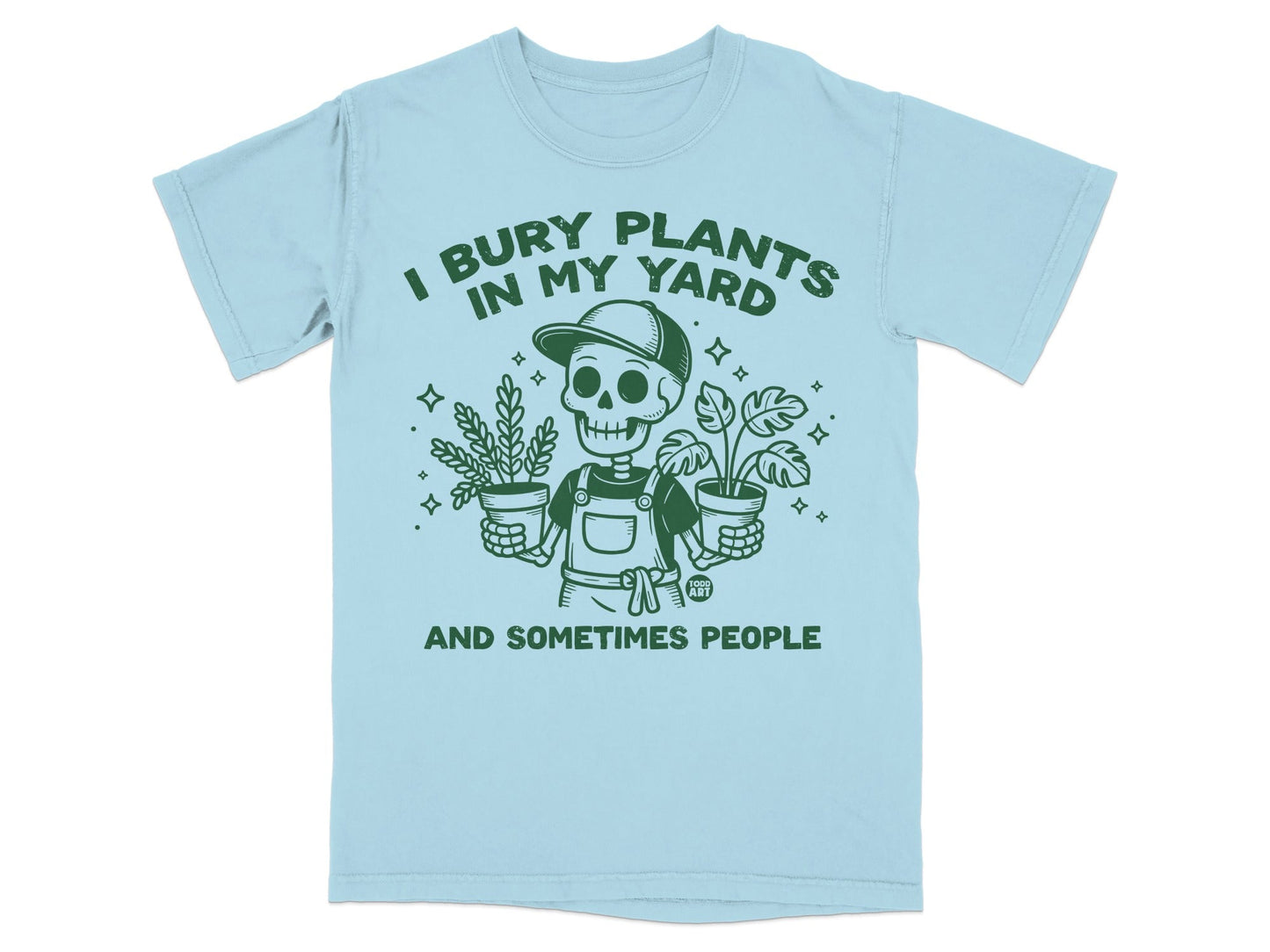 Light blue t-shirt with skeleton holding potted plants and text "I BURY PLANTS IN MY YARD AND SOMETIMES PEOPLE".