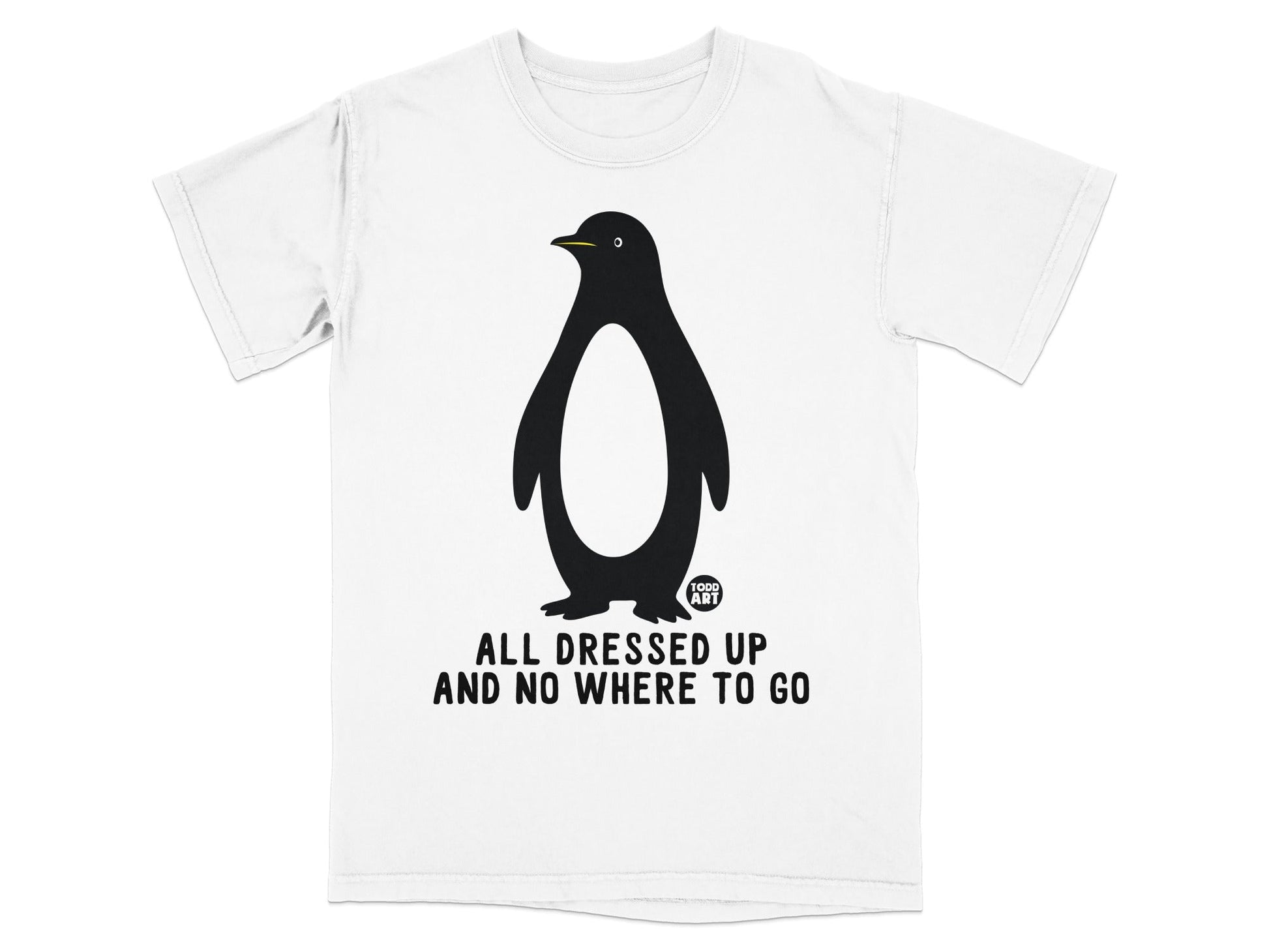 White t-shirt with a black penguin graphic and text "ALL DRESSED UP AND NO WHERE TO GO".