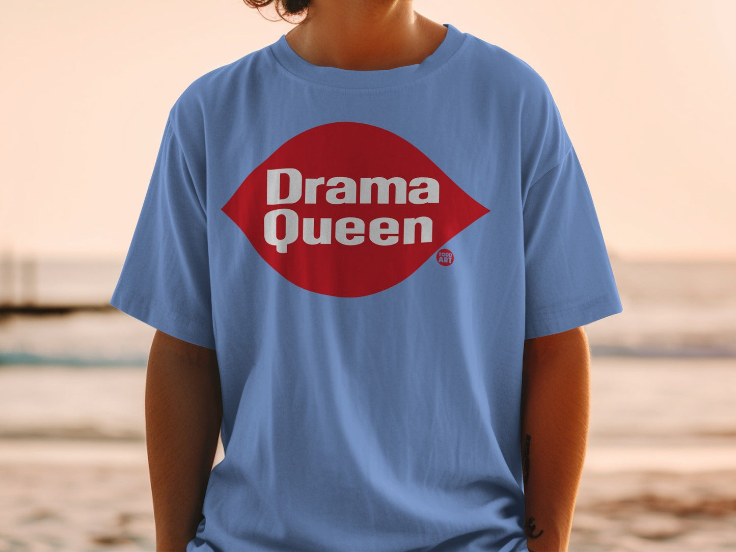 Blue t-shirt with "Drama Queen" in red diamond logo.